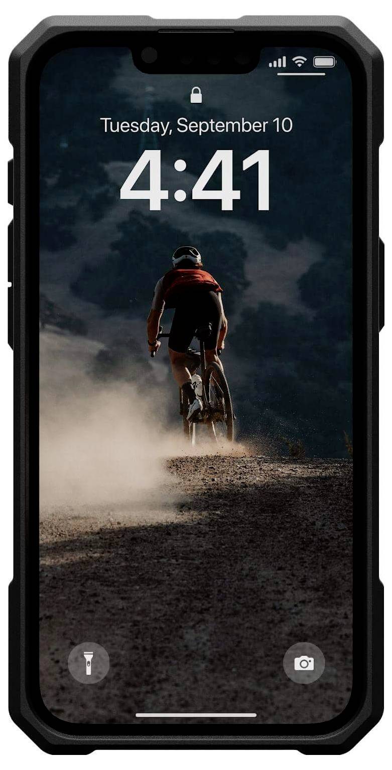 Ein Radfahrer fährt einen staubigen Hügel hinauf bei Sonnenuntergang. Der Smartphone-Bildschirm zeigt 'Dienstag, 10. September, 16:41'.