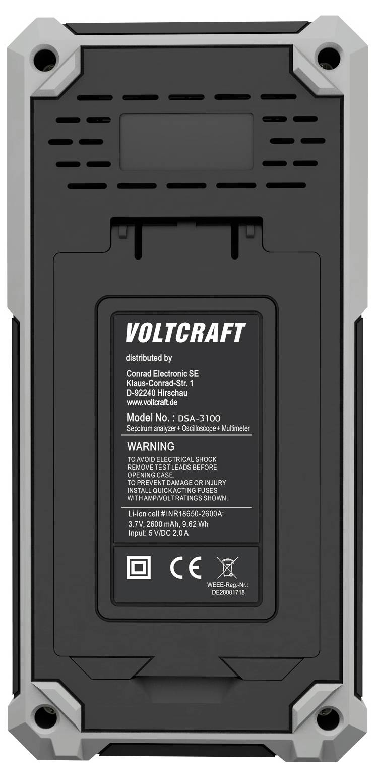 Ein digitales Gerät mit einer Beschriftung 'Voltcraft', Modellnummer 063A-310D, mit technischen Spezifikationen und einer Warnung vor elektrischem Schlag.