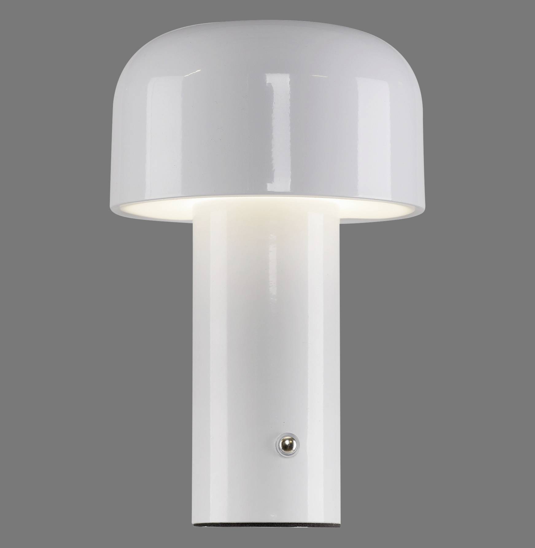 Weiße Tischlampe mit zylindrischem Fuß und kuppelartigem Schirm, leuchtet sanft in modernem Design.