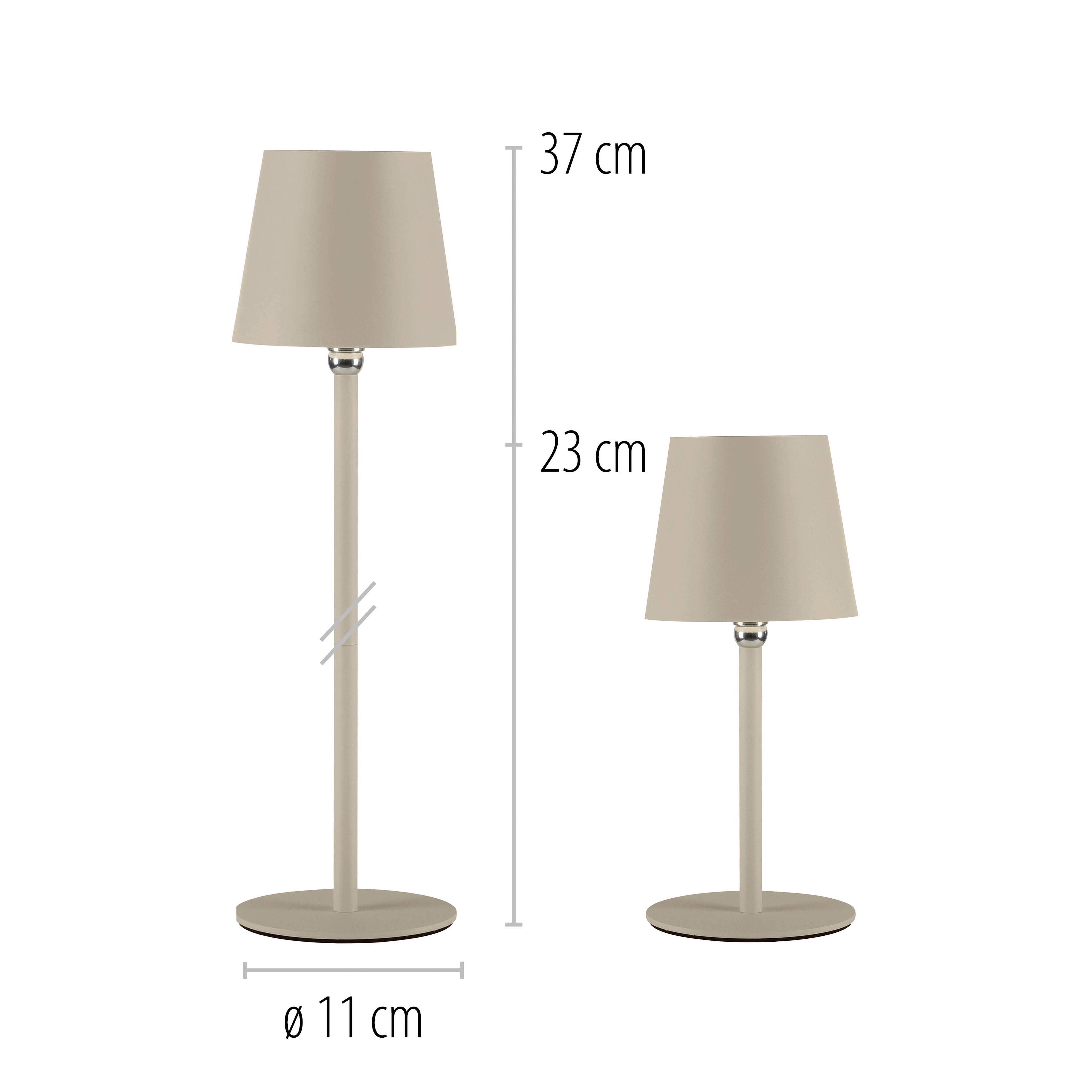 Zwei beigen Tischlampen unterschiedlicher Höhe: Links 37 cm, rechts 23 cm. Beide mit 11 cm Durchmesser.
