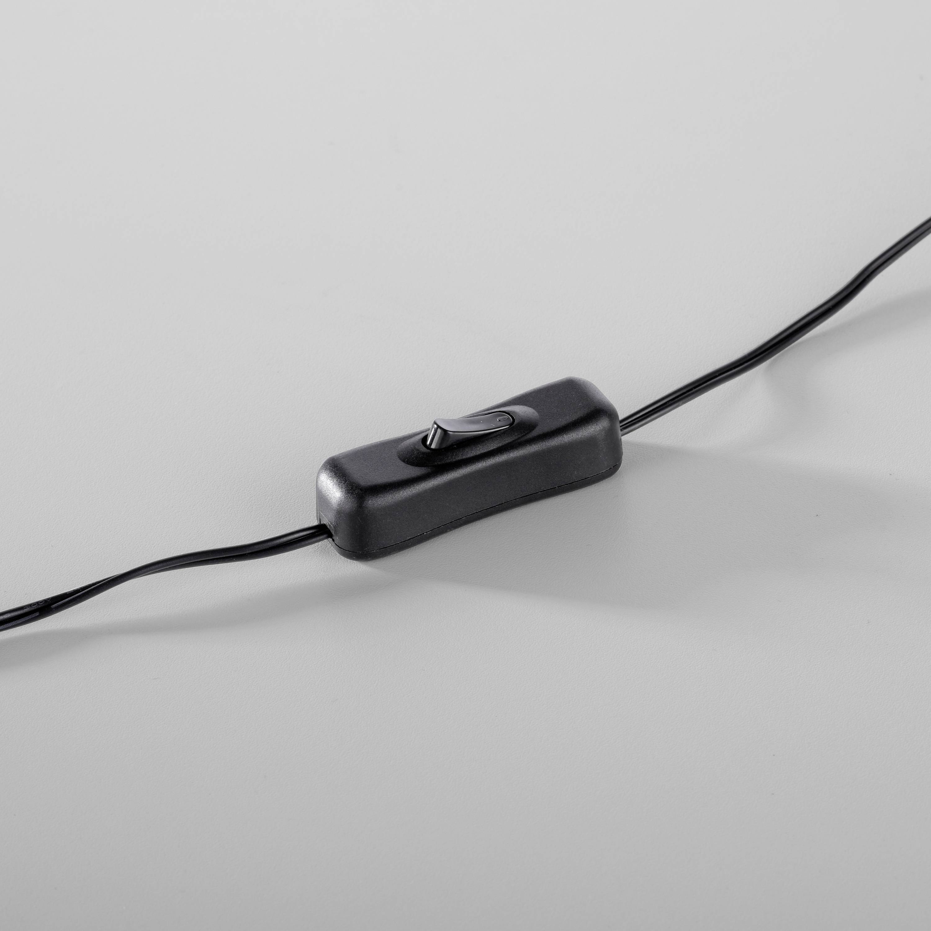 Ein schwarzer Kippschalter an einem Kabel auf grauem Hintergrund.