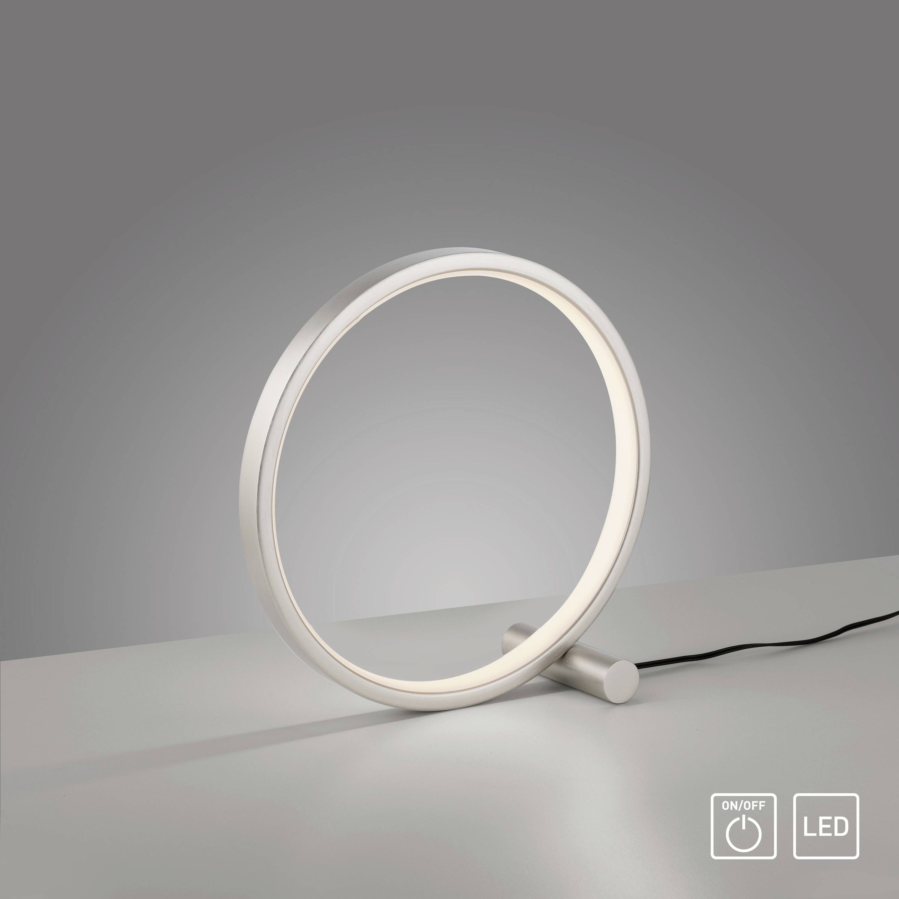 Runde LED-Lampe mit modernem Design, leuchtend auf einem Tisch. Steuerknopf 'On/Off' und LED-Symbol sichtbar.