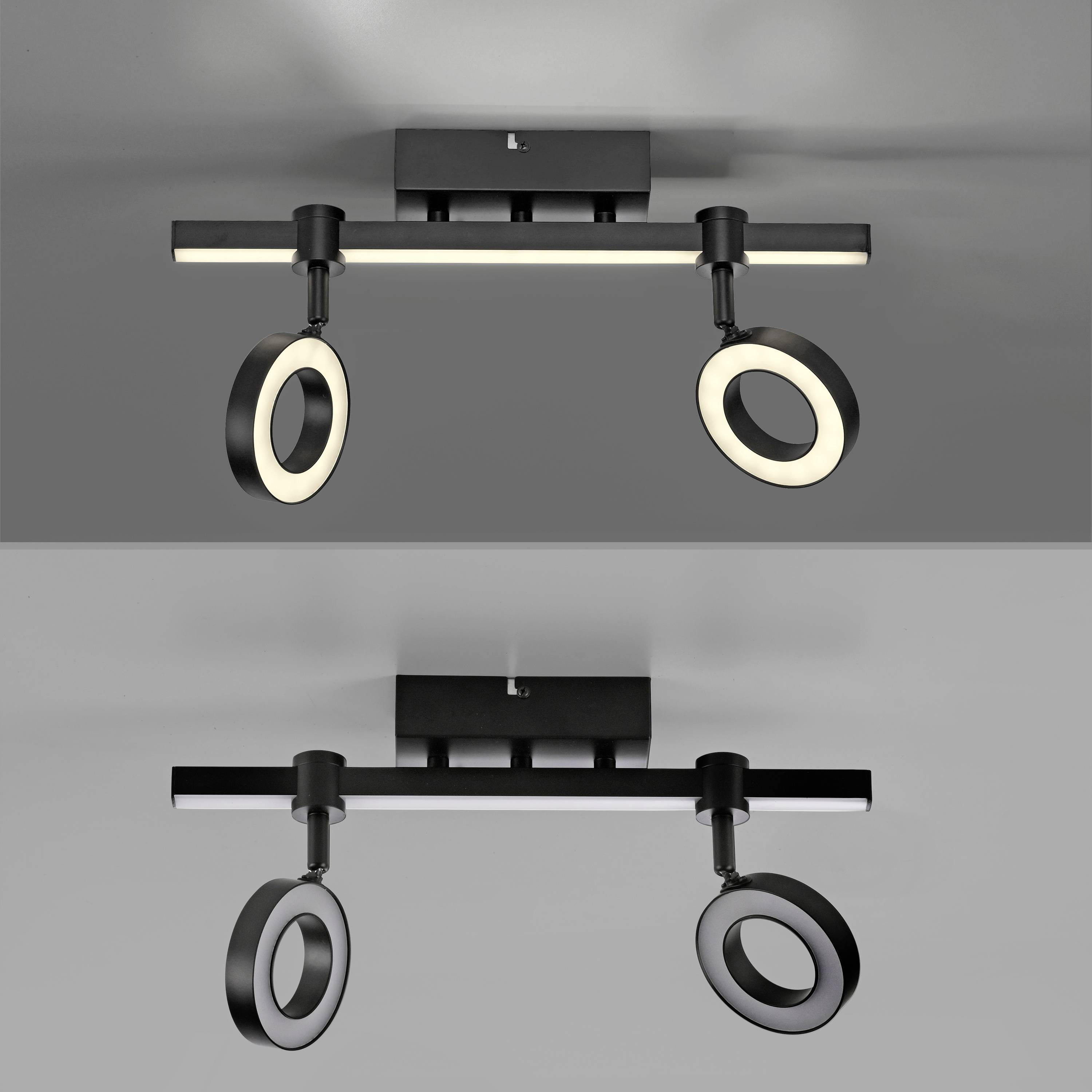 Schwarze Deckenlampe mit zwei runden, drehbaren Leuchten an einem Balken, leuchtend hell vor grauem Hintergrund. Ideal für modernes Interieur.