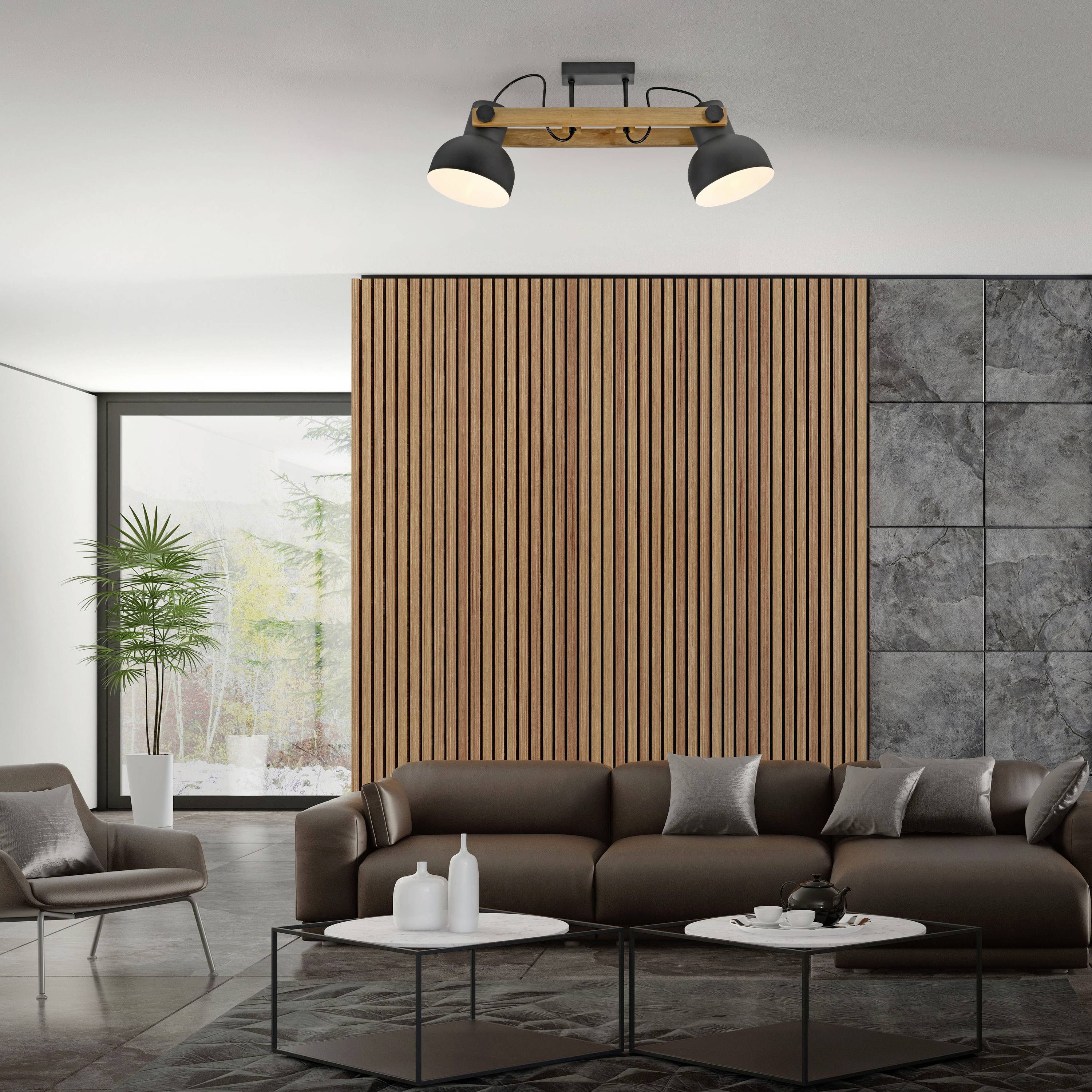 Wohnzimmer mit moderner Einrichtung: braunes Sofa, Couchtisch, Holzpaneelwand im Hintergrund, große Fenster und Zimmerpflanze.