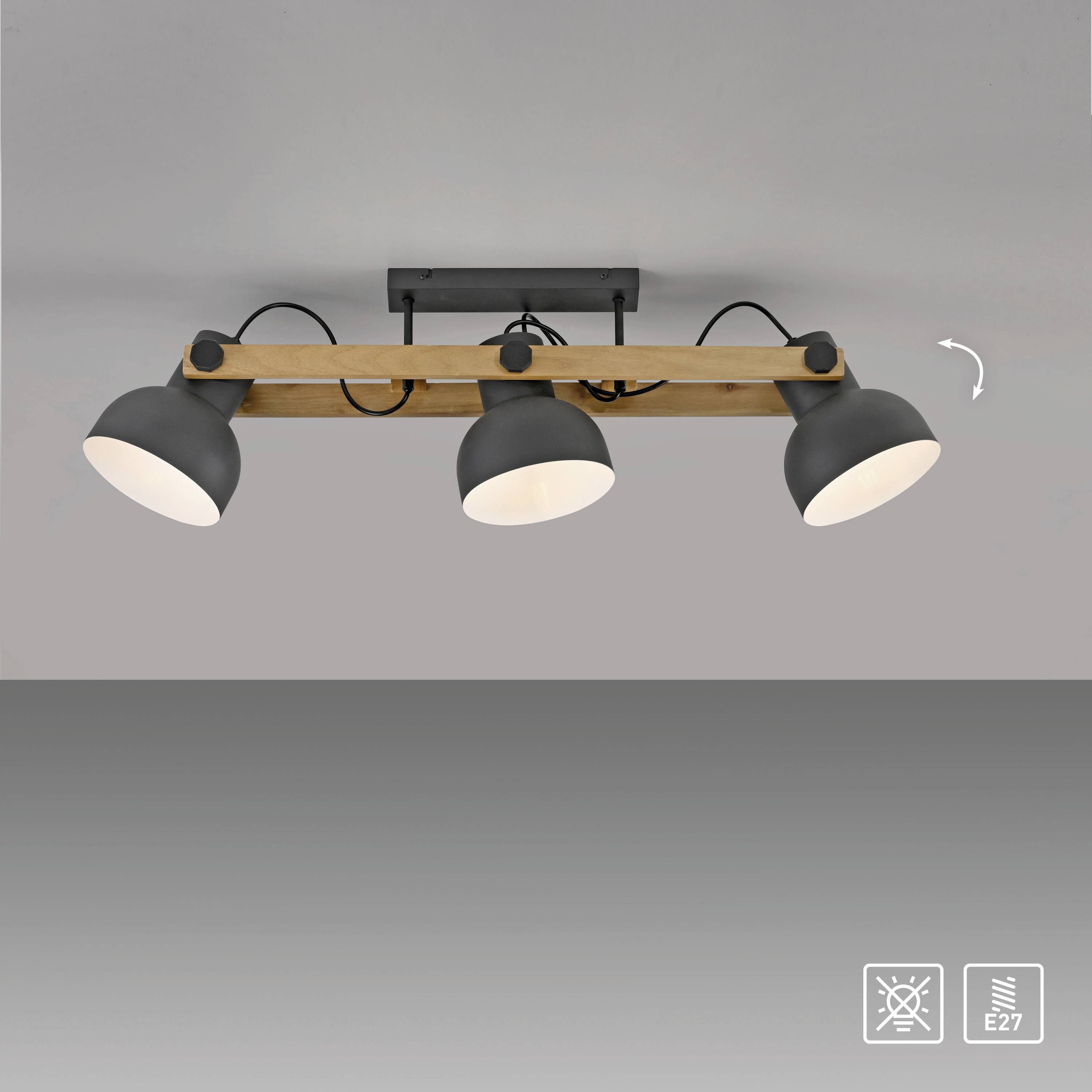 Deckenleuchte mit drei verstellbaren runden Lampen auf einem Holzbalken. Symbol zeigt E27 Fassung geeignet für LEDs.
