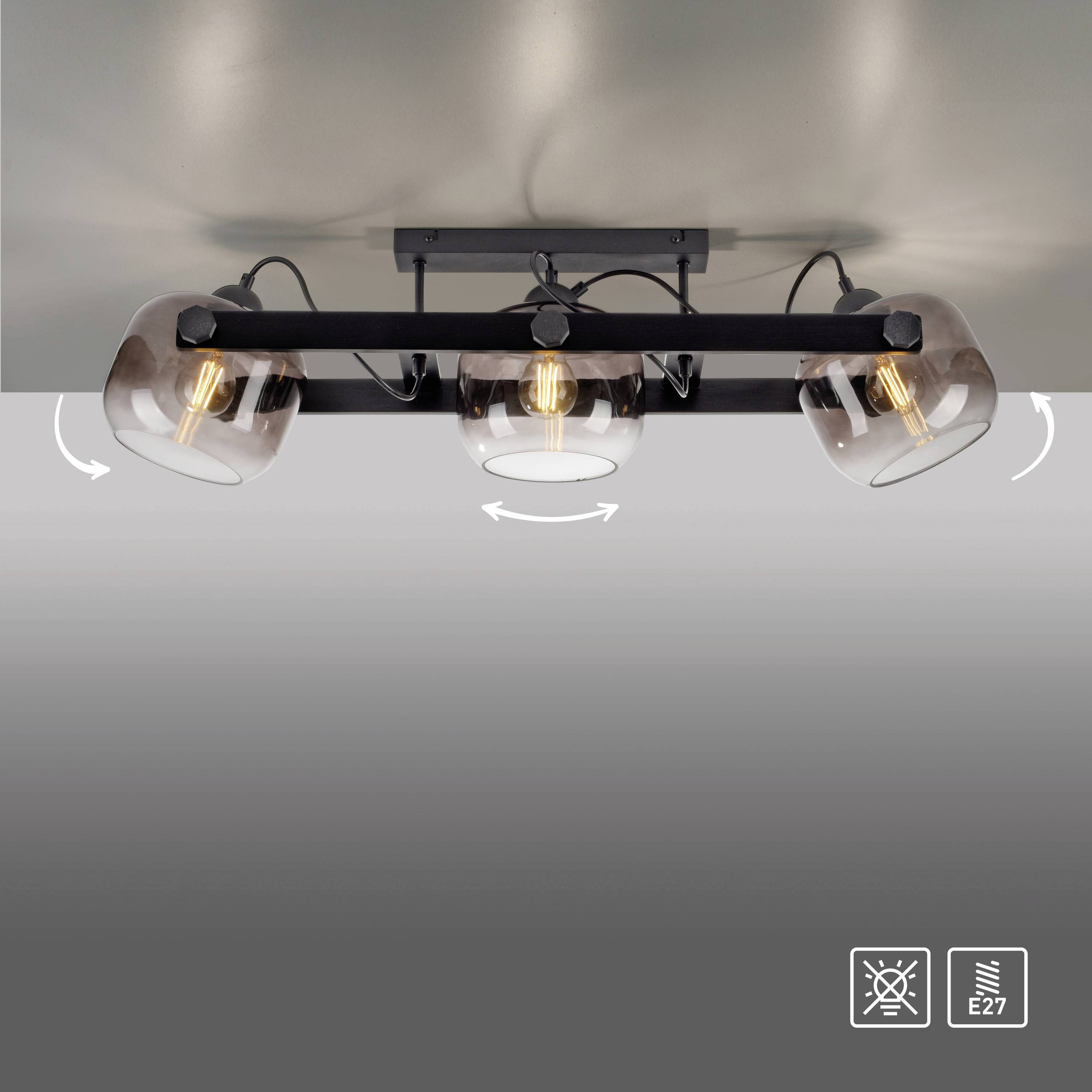 Deckenleuchte mit drei verstellbaren Rauchglaslampen, zeigt durch Pfeile die Drehmöglichkeiten. Icons unten: Dimmer und E27-Fassung.
