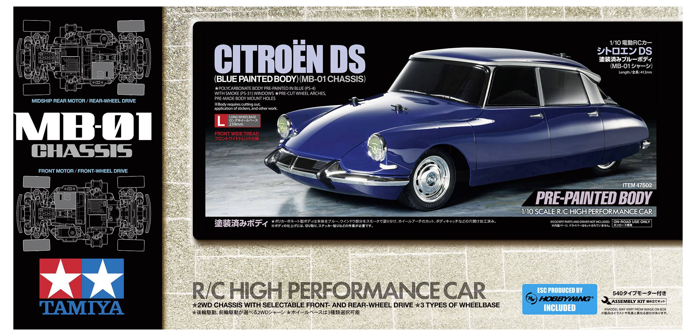 Verpackung eines TAMIYA Modellautos, zeigt ein blaues Citroën DS Fahrzeug. Text: 'MB-01 Chassis', 'Vorlackierte Karosserie', 'Maßstab 1:10'.
