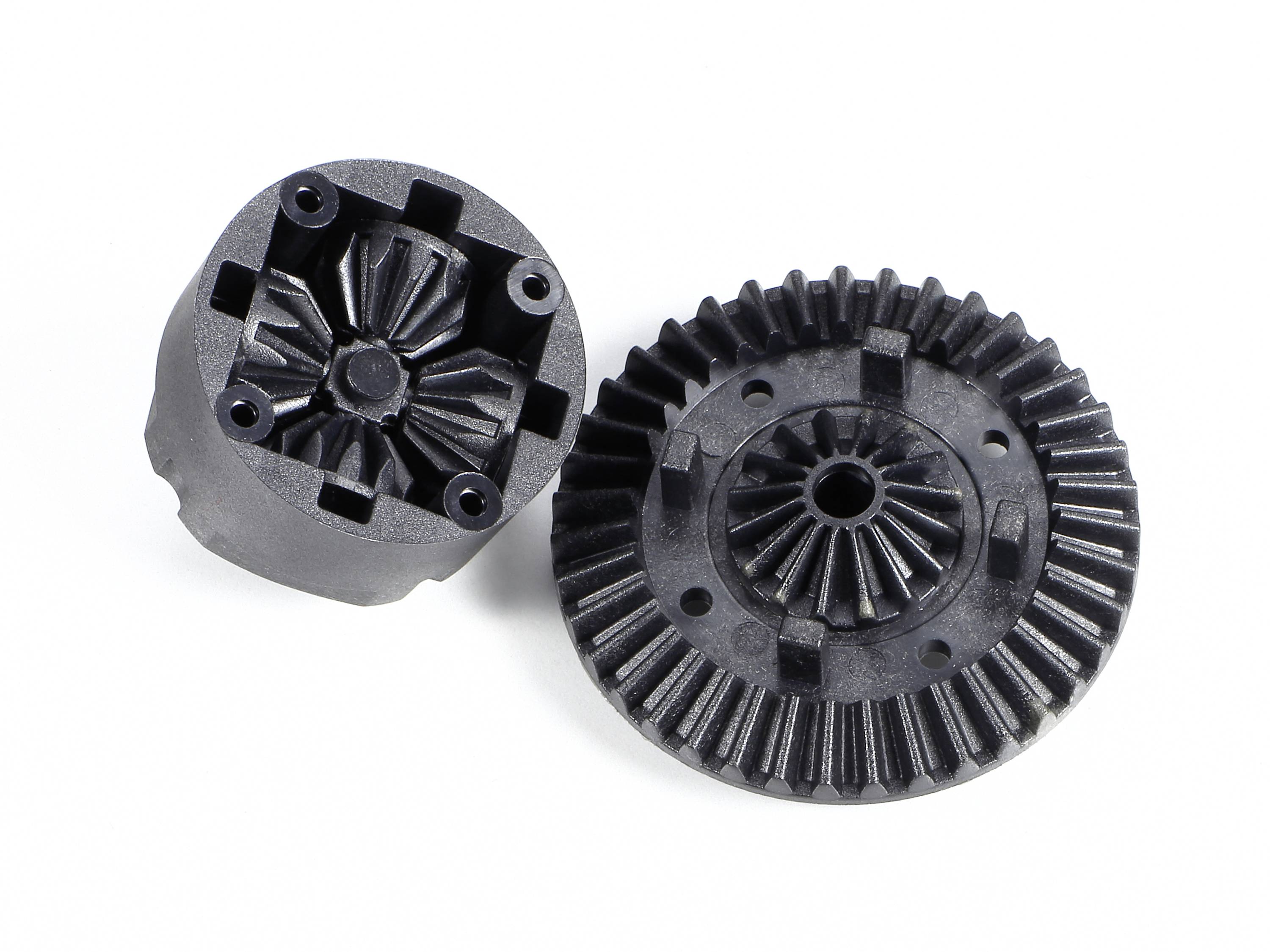 Zwei schwarze Zahnräder aus Kunststoff, eines geöffnet, um das Innenleben zu zeigen. Mechanische Bauteile, möglicherweise für Modellbau.
