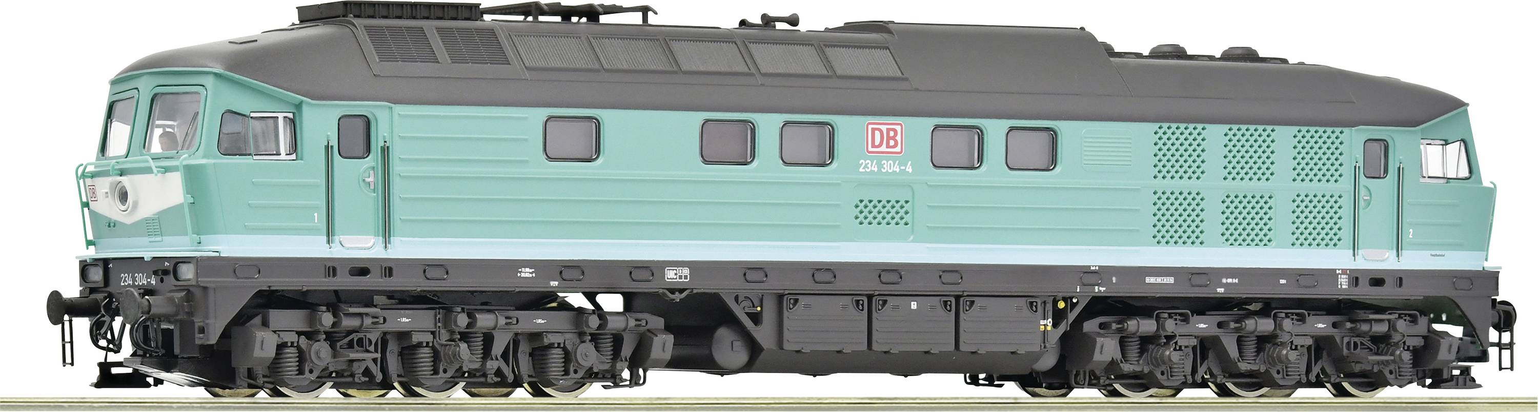 Eine grün-schwarze Lokomotive der Deutschen Bahn mit der Aufschrift 'DB Schenker'.