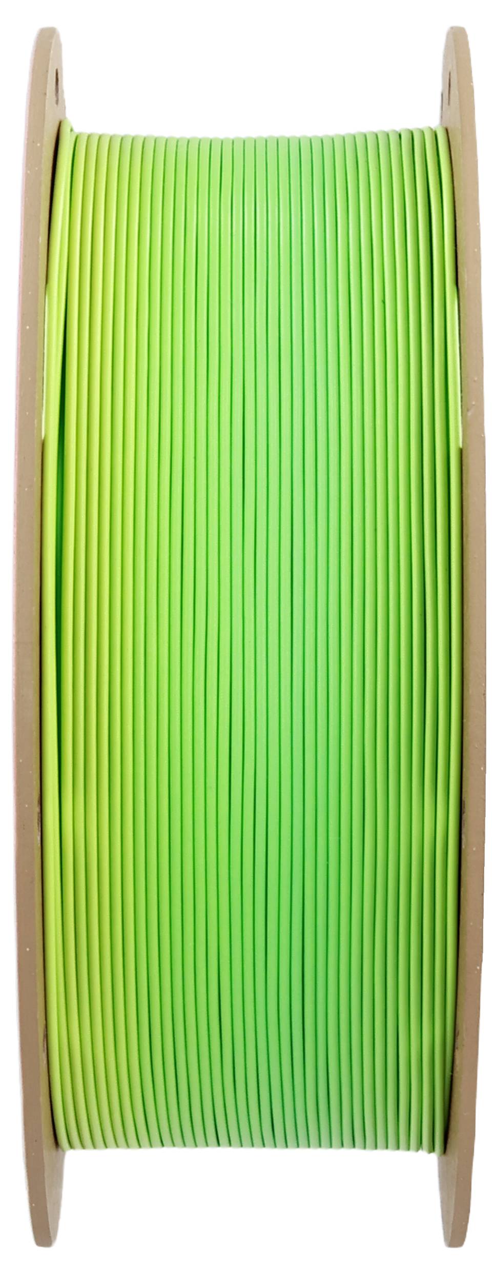Grüne Filamentspule, stehend aufrecht, für 3D-Drucker.