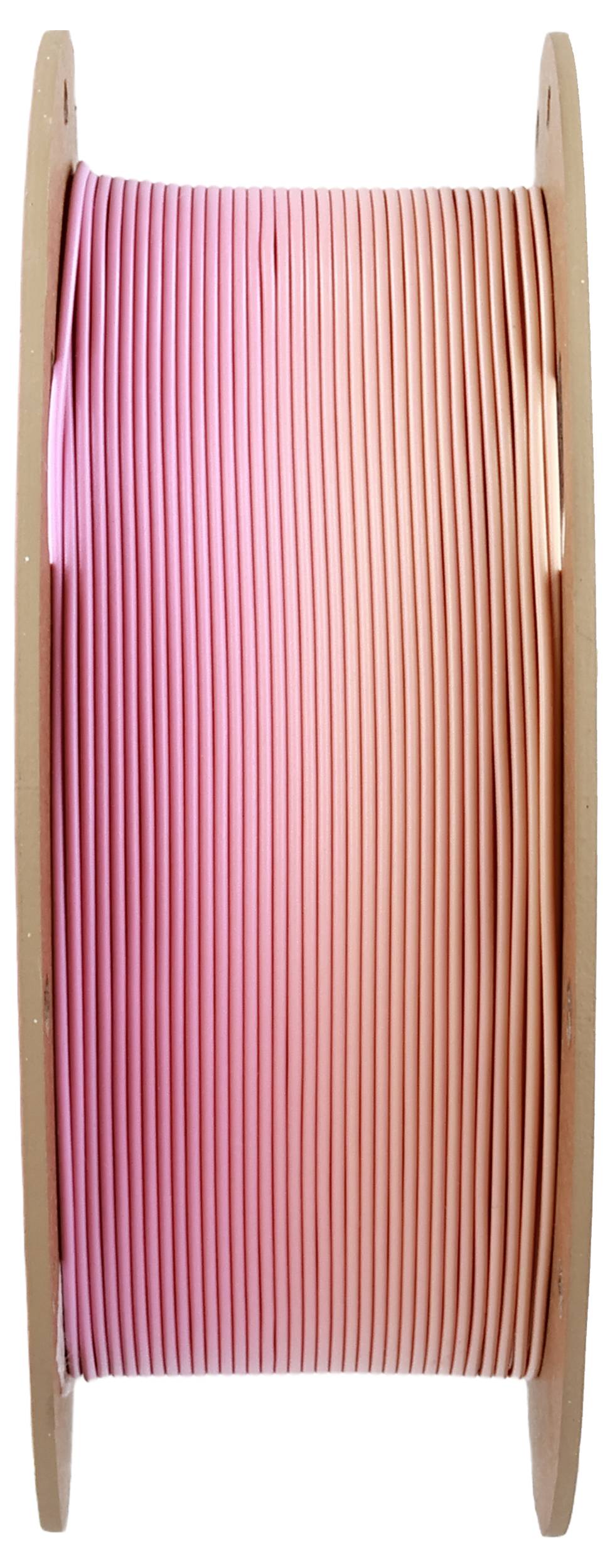Eine große Spule mit rosafarbenem Kabel, aufgerollt zwischen zwei runden Holzscheiben, seitliche Ansicht.