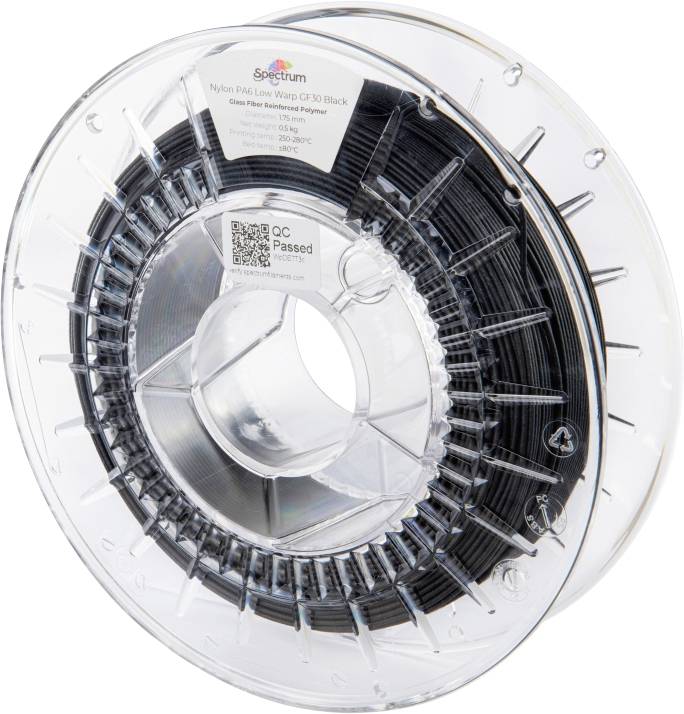 Eine Kunststoffspule mit schwarzem Nylon-3D-Druckfilament. Aufkleber zeigt technische Details wie Materialart und empfohlene Drucktemperaturen.