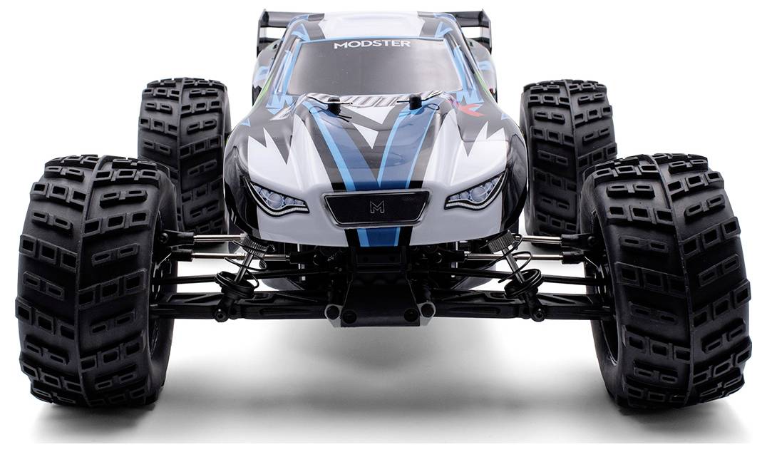 Ferngesteuertes Modellauto mit großen, grobstolligen Reifen und aerodynamischem Design. Das Auto hat eine schwarz-weiße Karosserie.