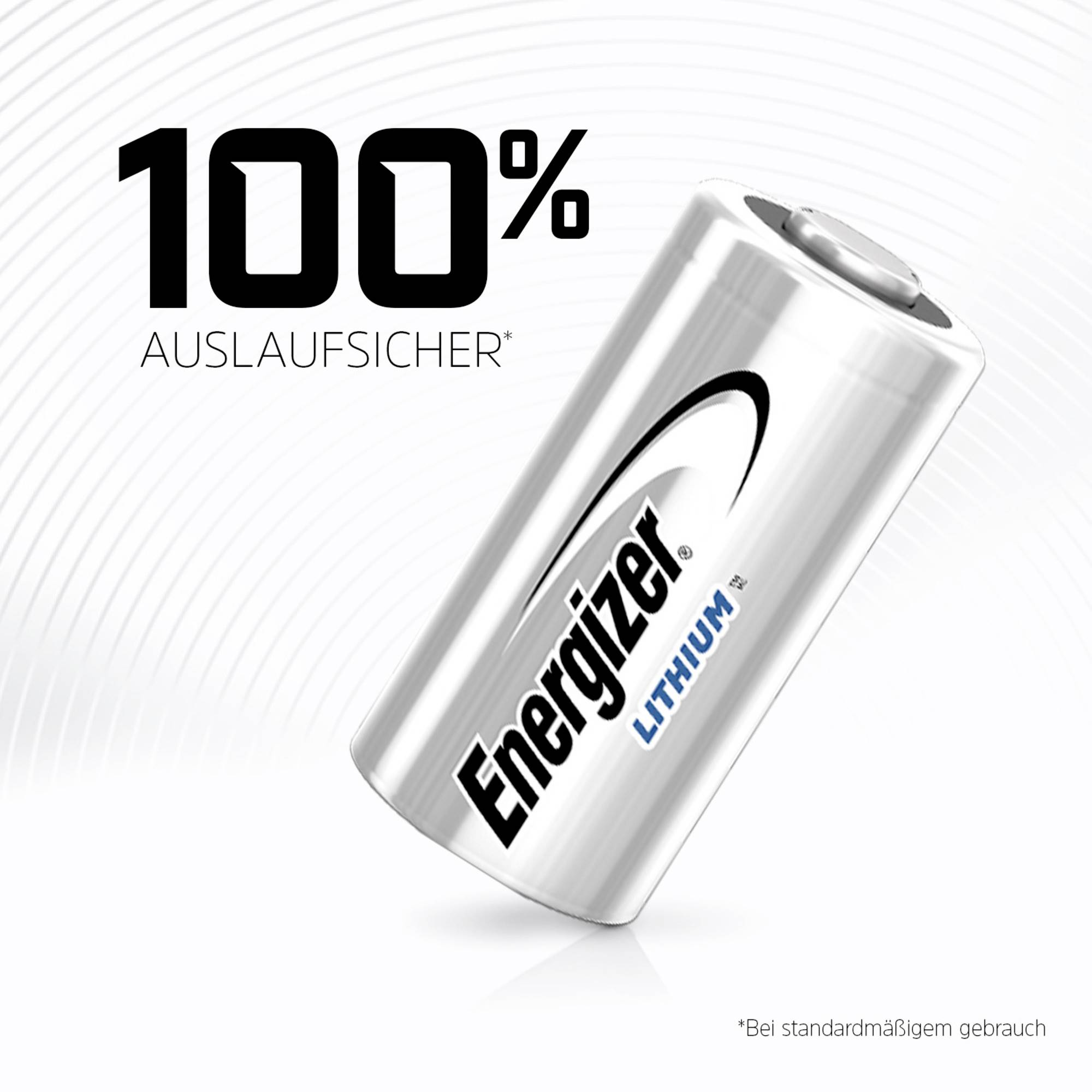 Batterie von 'Energizer', Lithium, mit Claim '100% auslaufsicher bei standardmäßigem Gebrauch'. Hintergrund mit Kreismuster.