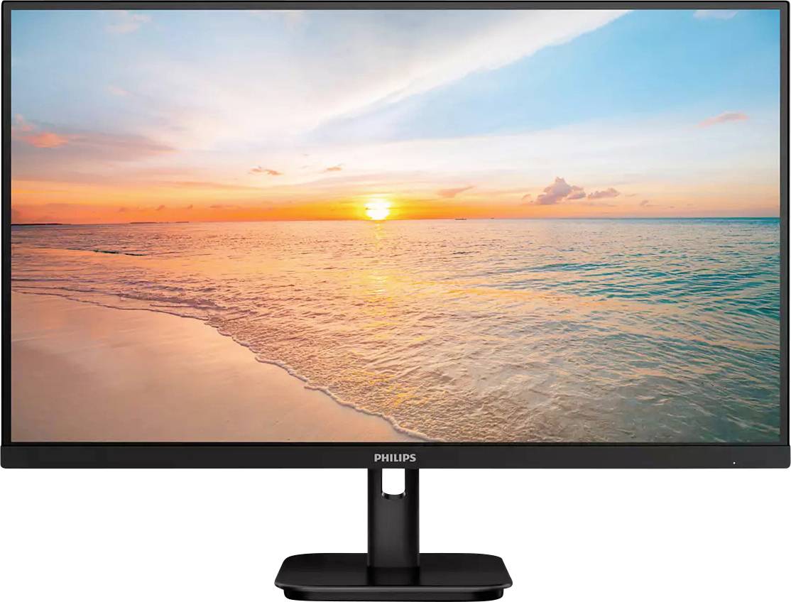 Ein Monitor mit einem Bild von einem Sonnenuntergang über einem ruhigen Strand und Meer. Der Himmel ist bunt gefärbt.