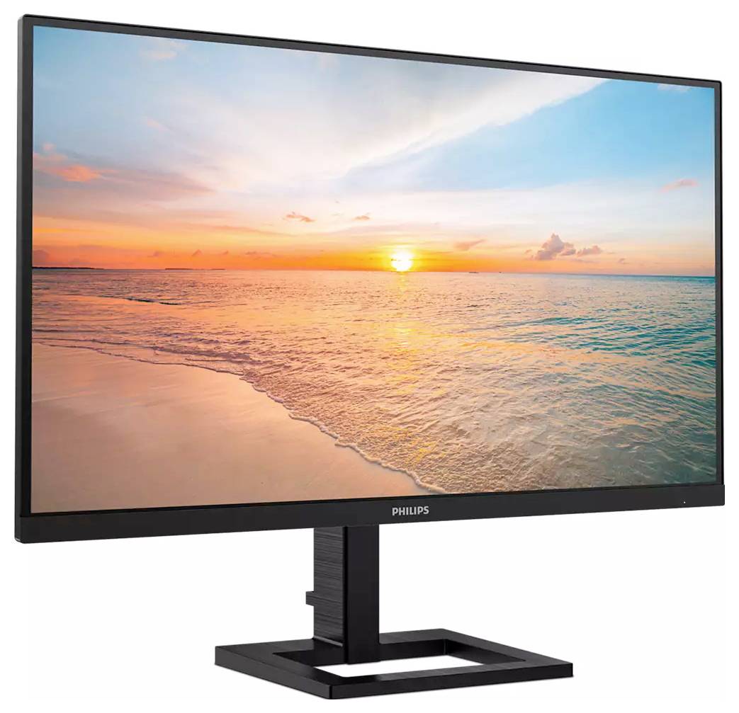 Ein Monitor zeigt ein Strandbild bei Sonnenuntergang. Der Himmel ist blau und orange.