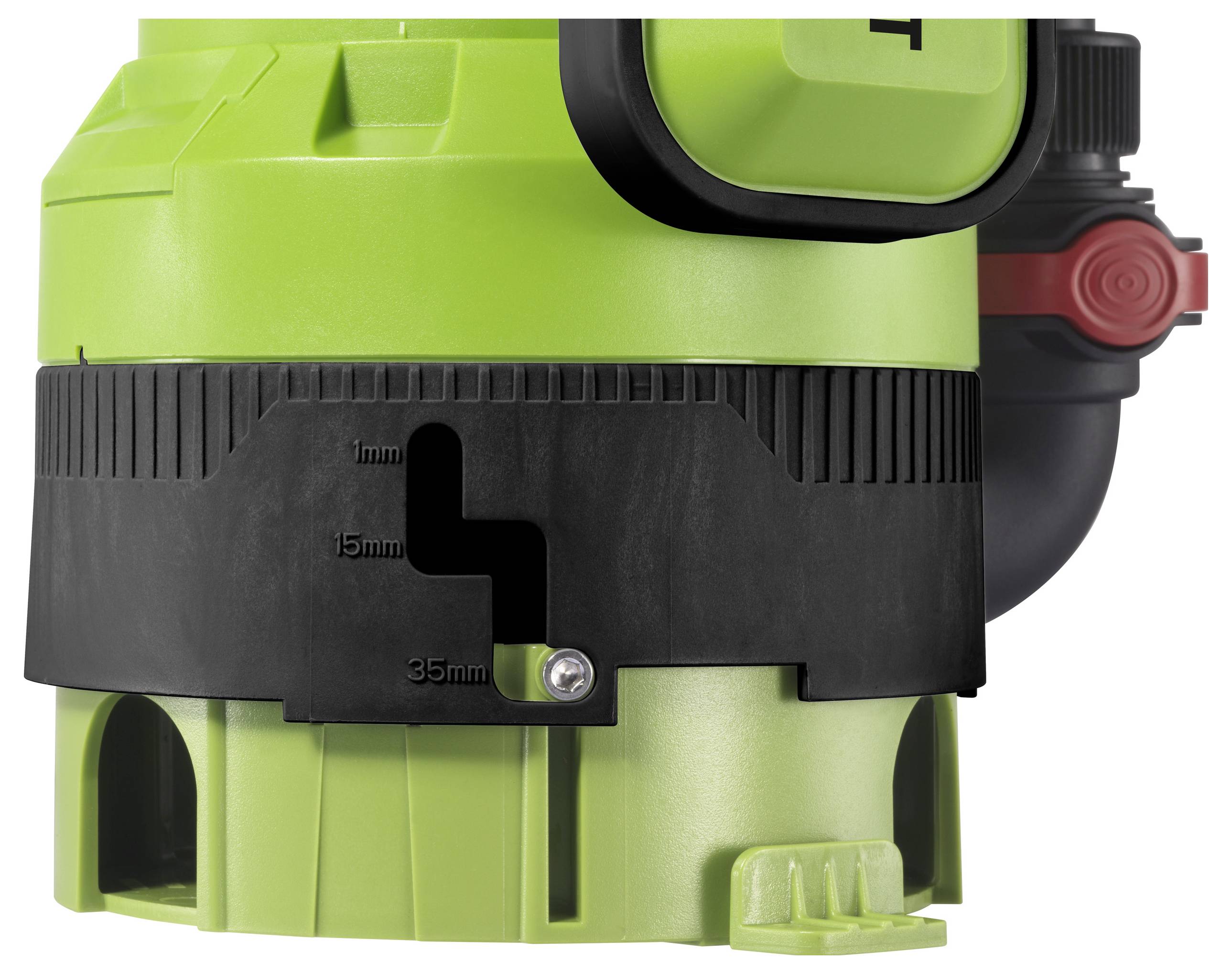 Grüne Maschine mit schwarzem Kunststoffteil, auf dem Maße von 1 mm, 15 mm, 35 mm angezeigt sind. Teil eines größeren Geräts.