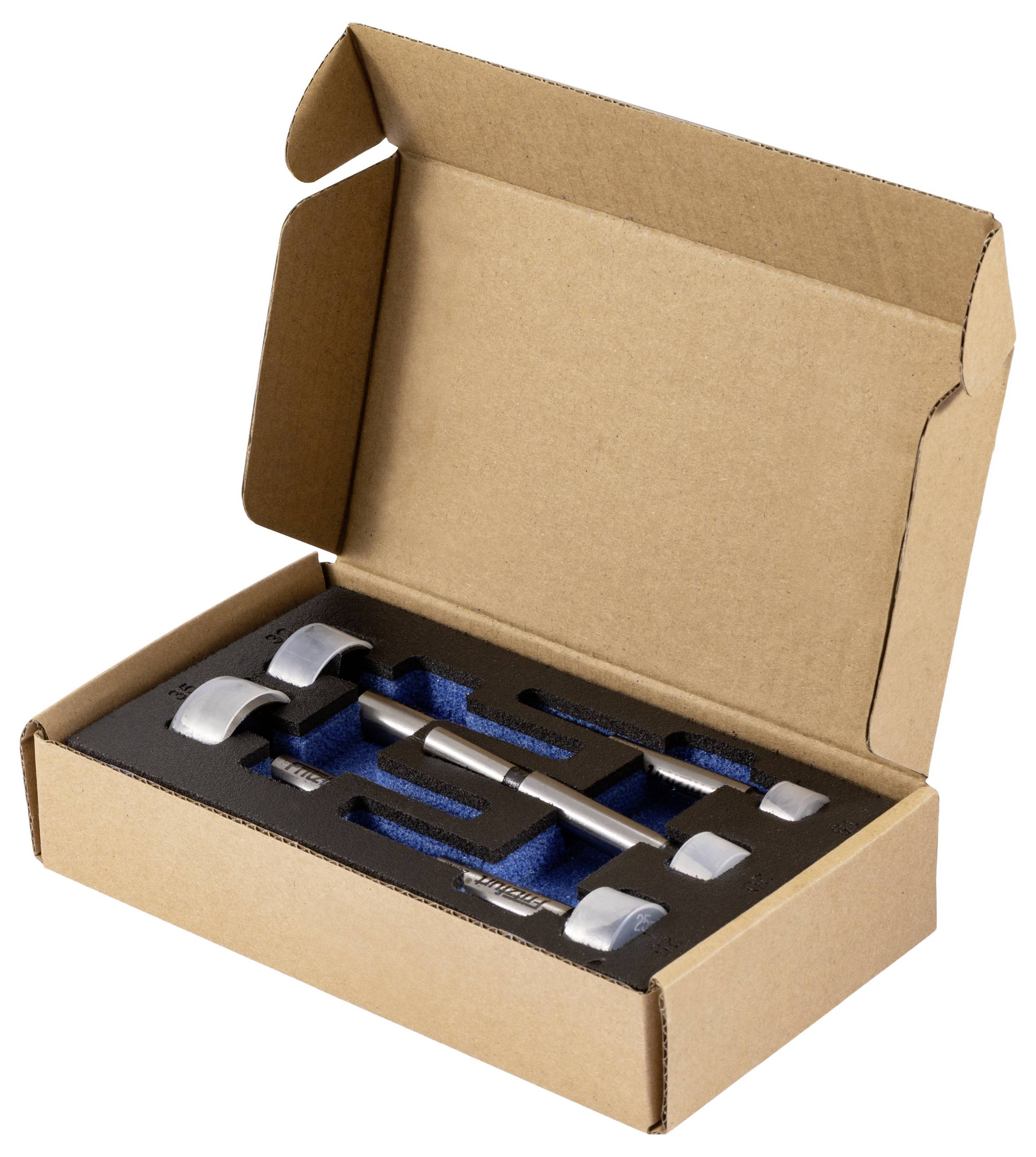 Eine Pappschachtel wurde geöffnet, um einen Schaumstoffeinsatz zu zeigen, der einen Satz Metallgewichte enthält, möglicherweise Kalibrierwerkzeuge, wobei jedes Stück in einer maßgeschneiderten Aussparung gesichert ist.