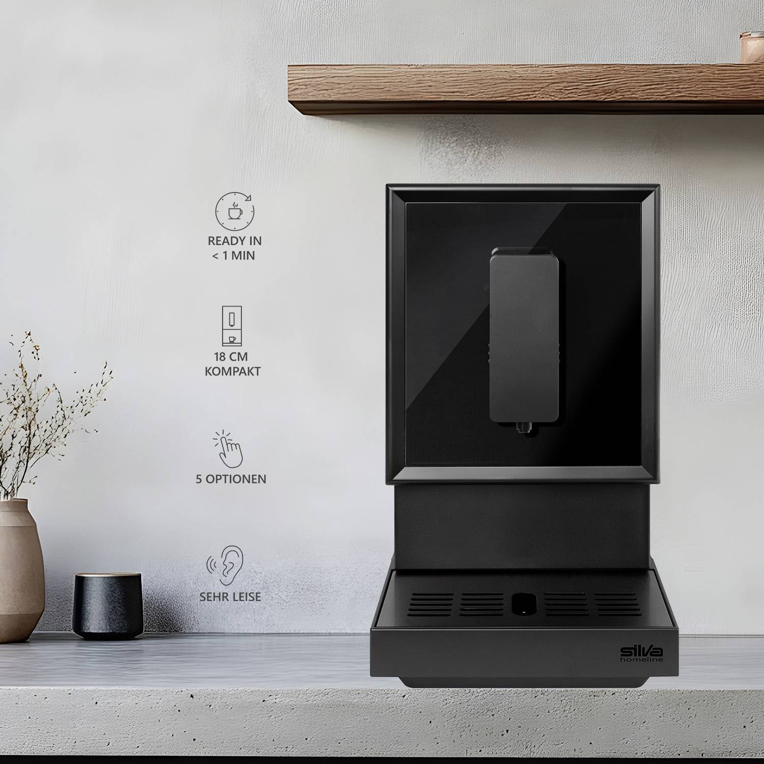 Ein schwarzer Wasserspender auf einer grauen Arbeitsplatte vor hellgrauer Wand. Links Symbole: schnell, kompakt, 5 Optionen, leise.