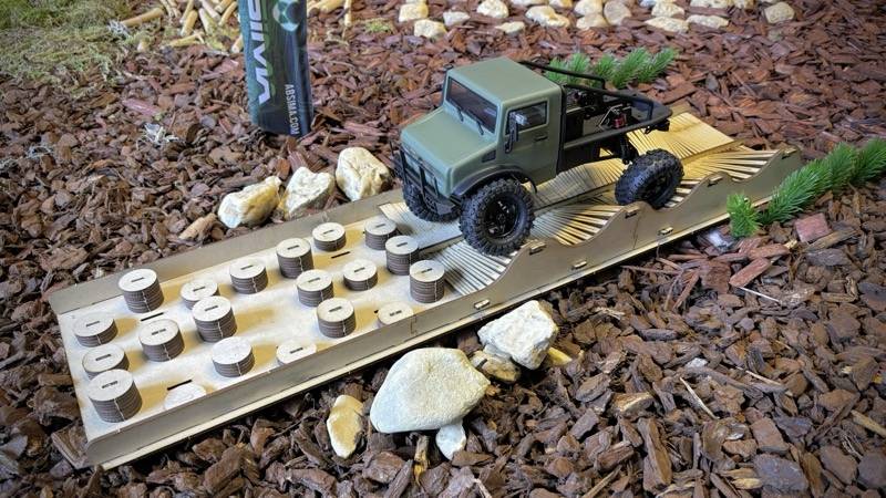 Absima 2320203 Fahrbahnhindernis Wooden Piles & Waves (L x B x H) 680 x 180 x 55mm 1St.