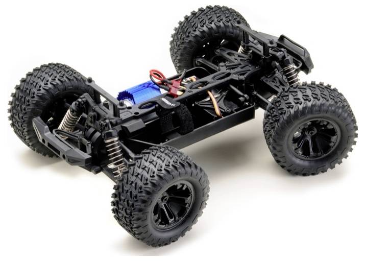 Ein ferngesteuertes Autoc­hassis mit großen Geländereifen, freigelegter Schaltung und Federungsfeder­n, entwickelt für die hochleistungs­fähige Geländenavigation.
