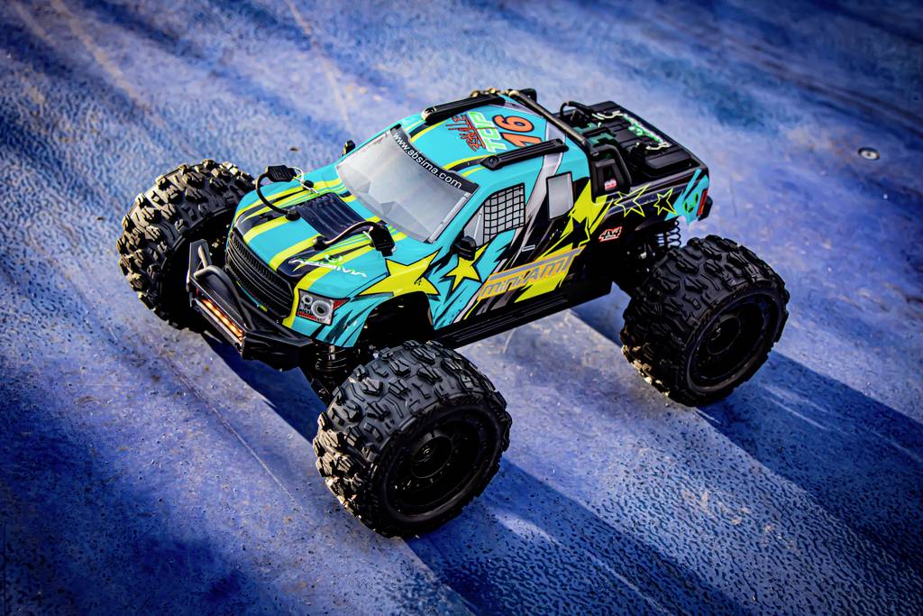 Absima Mini AMT Fluo Blau Brushless 1:16 RC Modellauto Elektro Monstertruck Allradantrieb (4WD) RtR 2,4GHz