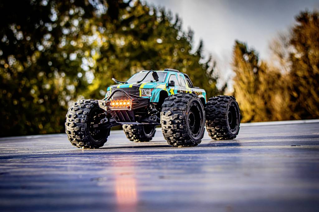 Absima Mini AMT Fluo Blau Brushless 1:16 RC Modellauto Elektro Monstertruck Allradantrieb (4WD) RtR 2,4GHz