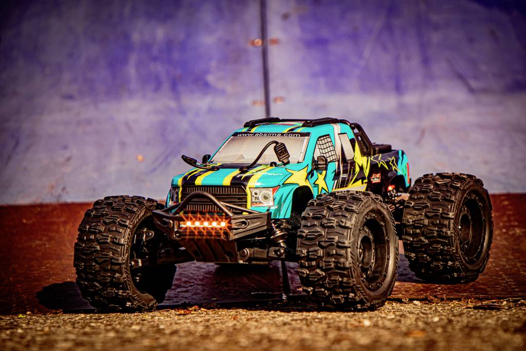 Absima Mini AMT Fluo Blau Brushless 1:16 RC Modellauto Elektro Monstertruck Allradantrieb (4WD) RtR 2,4GHz