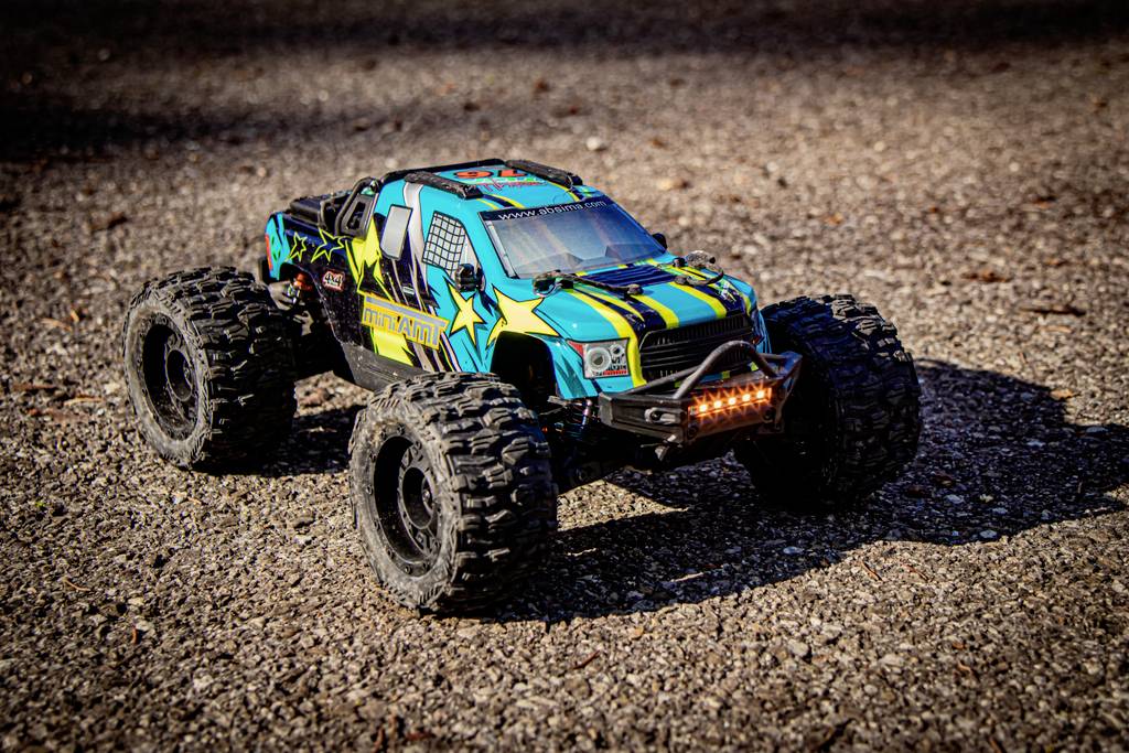 Absima Mini AMT Fluo Blau Brushless 1:16 RC Modellauto Elektro Monstertruck Allradantrieb (4WD) RtR 2,4GHz