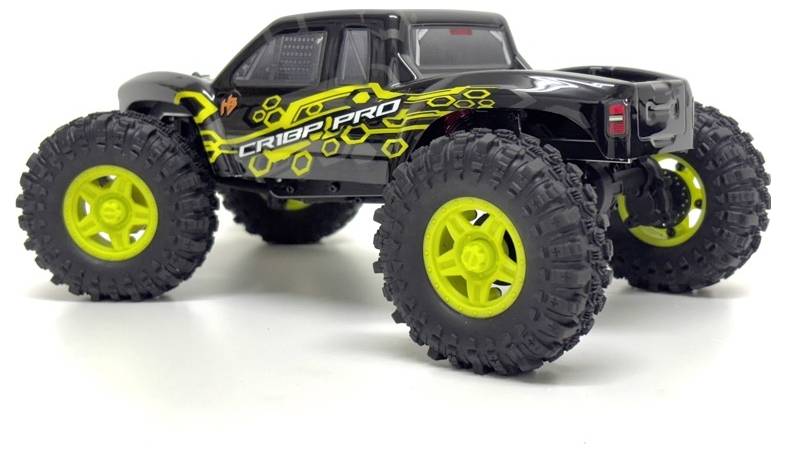 Schwarzes Spielzeugauto mit gelben Akzenten und großen Offroad-Reifen, in Seitenansicht gezeigt.