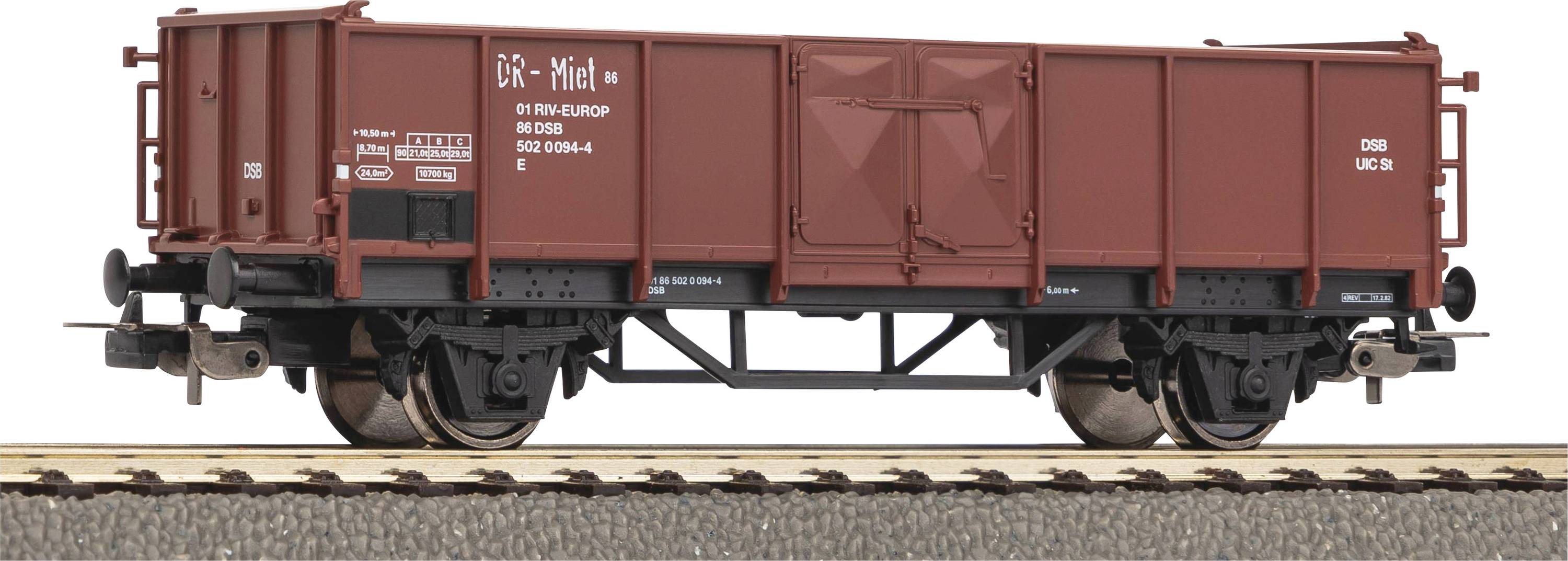 Ein brauner Güterwaggon auf einem Gleis. An der Seite steht 'DRG - 1918'. Klar erkennbare Details der mechanischen Teile.