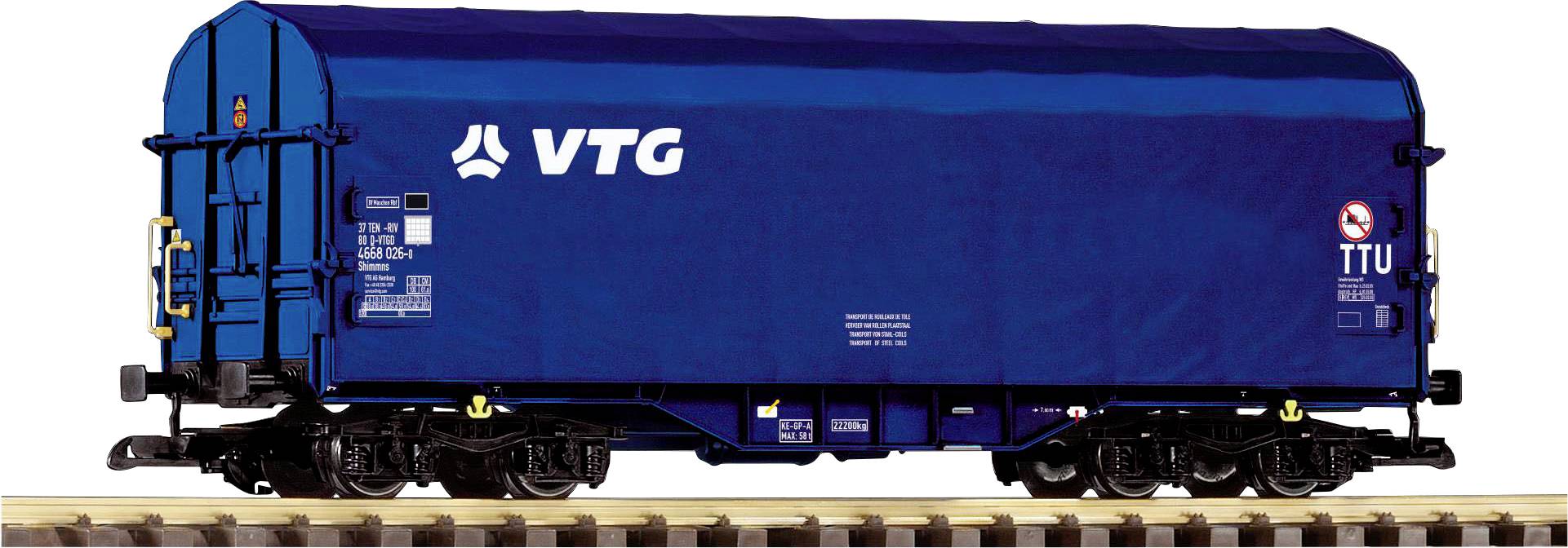 Ein blauer Güterwaggon der Firma VTG auf Schienen, mit detaillierter Beschriftung der technischen Daten und Sicherheitszeichen.