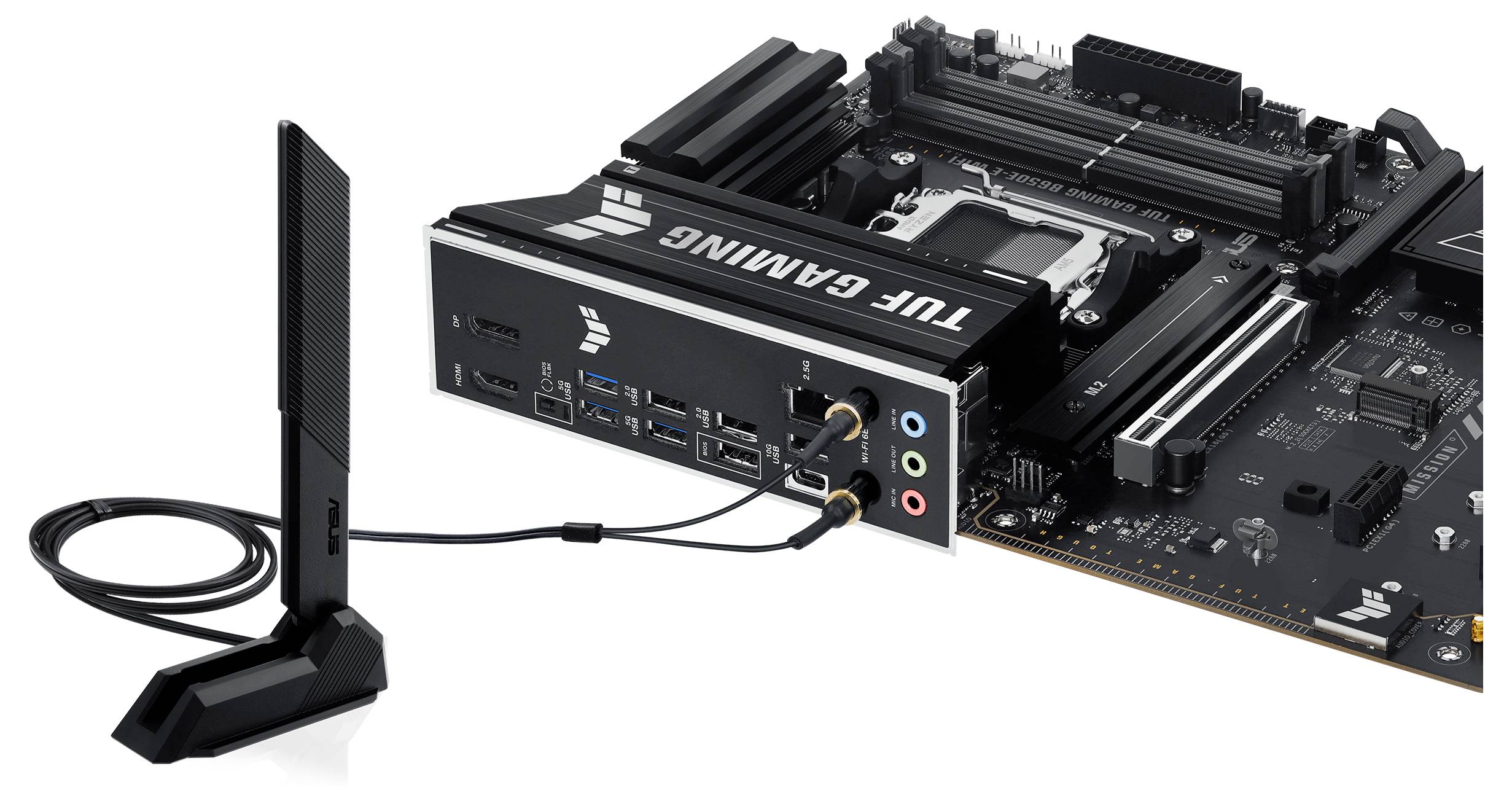 Ein Motherboard mit der Aufschrift 'TUF GAMING' zeigt diverse Anschlussmöglichkeiten. Ein kleiner, aufrechter Antennenstandfuß ist über Kabel mit dem Motherboard verbunden.
