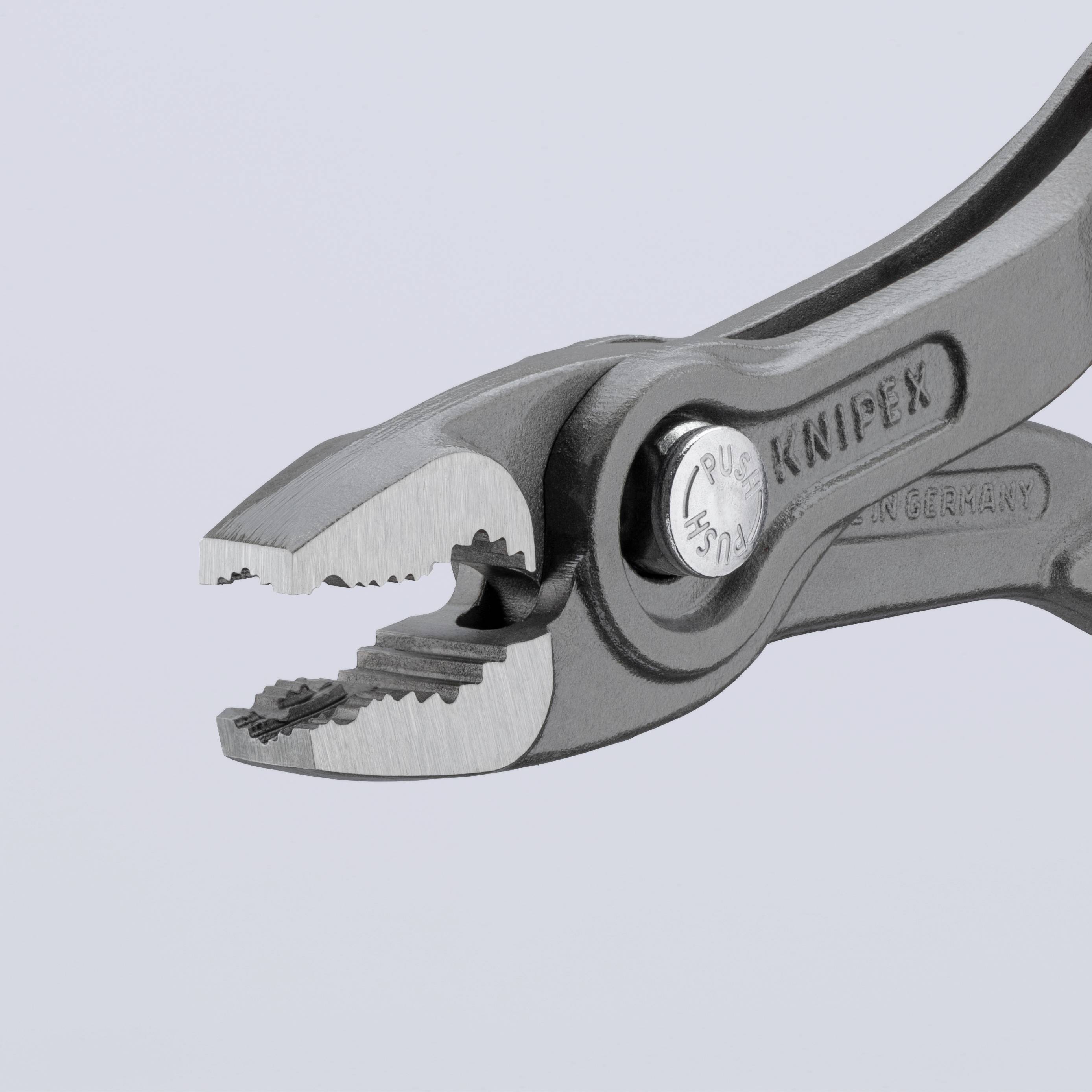 Die Abbildung zeigt eine Zange der Marke 'Knipex' mit einem ergonomischen Design, spezialisiert für präzises Greifen und Schneiden.