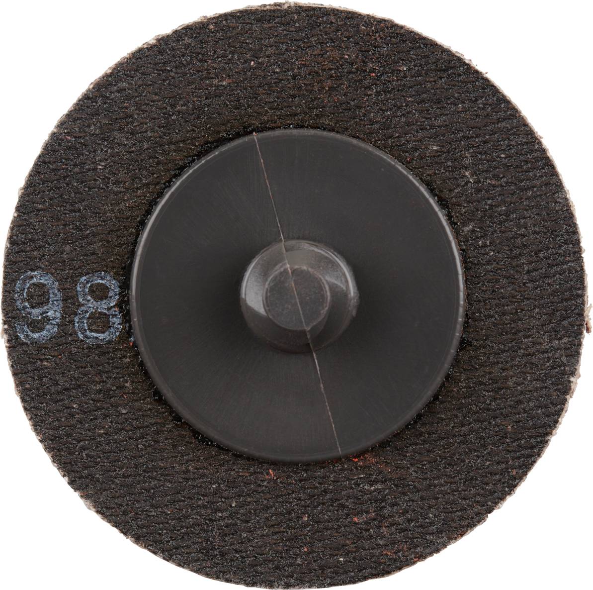 Eine runde, schwarze Schleifscheibe mit einer zentralen Befestigungsschraube auf braunem Hintergrund. Links die Zahl '98'.
