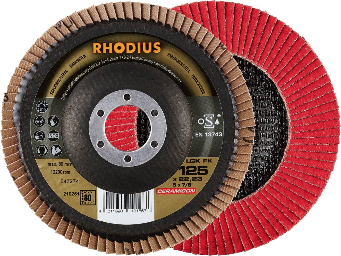 Schleifscheiben mit der Aufschrift 'RHODIUS', ausgerichtet zur Oberflächenbearbeitung, zeigen unterschiedliche Körnungen und Strukturen.