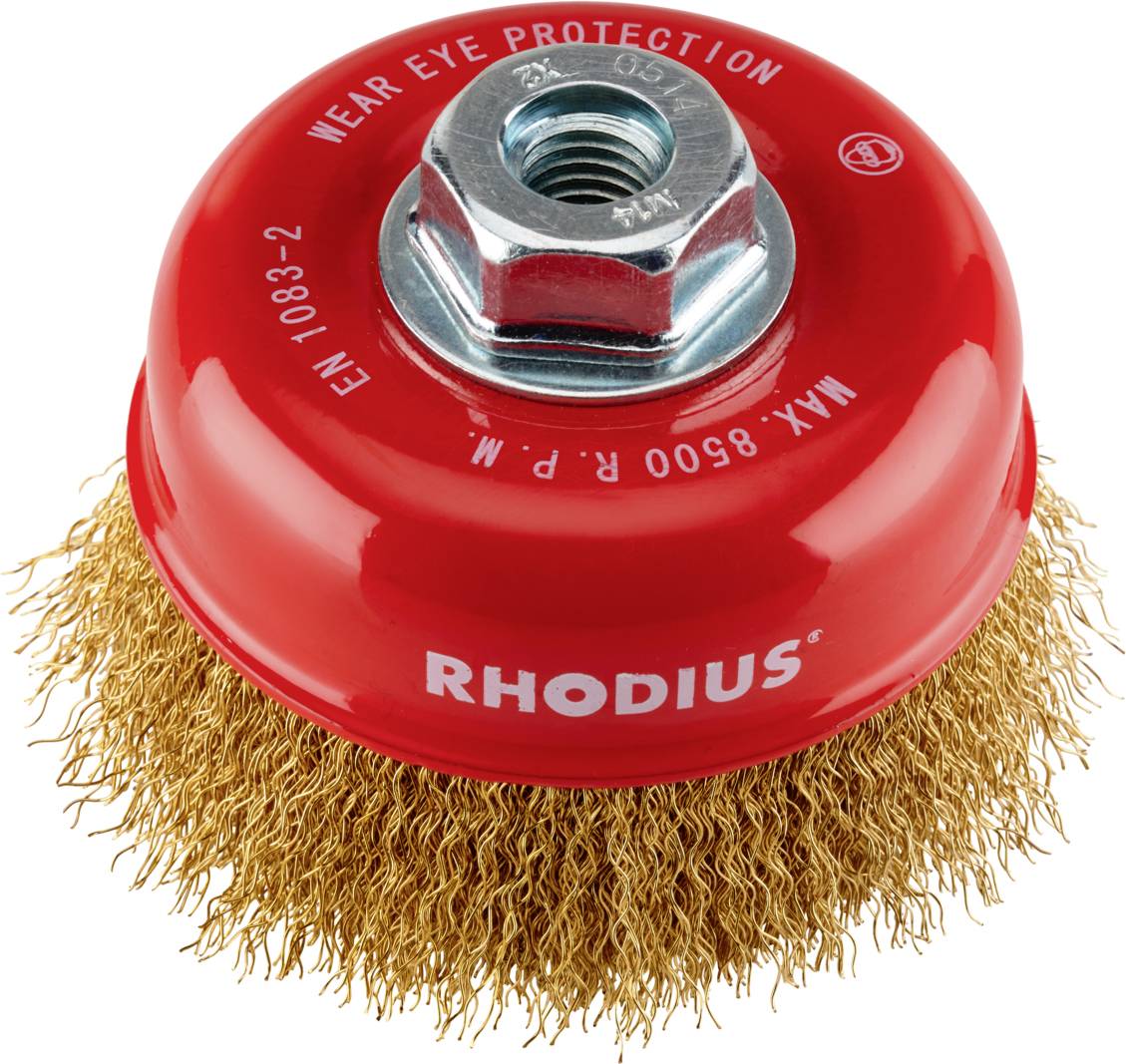 Rote Drahtbürste mit Aufschrift 'RHODIUS'. Oberseite mit Metallgewinde. Sicherheitswarnung 'WEAR EYE PROTECTION' oben.