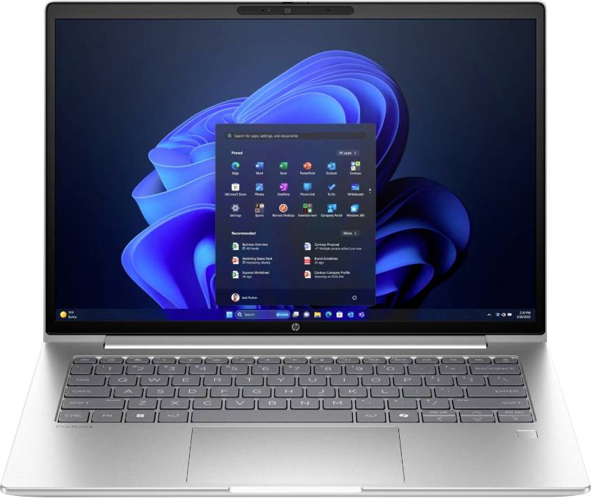 Ein geöffneter Laptop zeigt das Windows 11-Startmenü auf dem Bildschirm. Das Gerät hat eine silberne Tastatur und einen schwarzen Bildschirmrahmen.