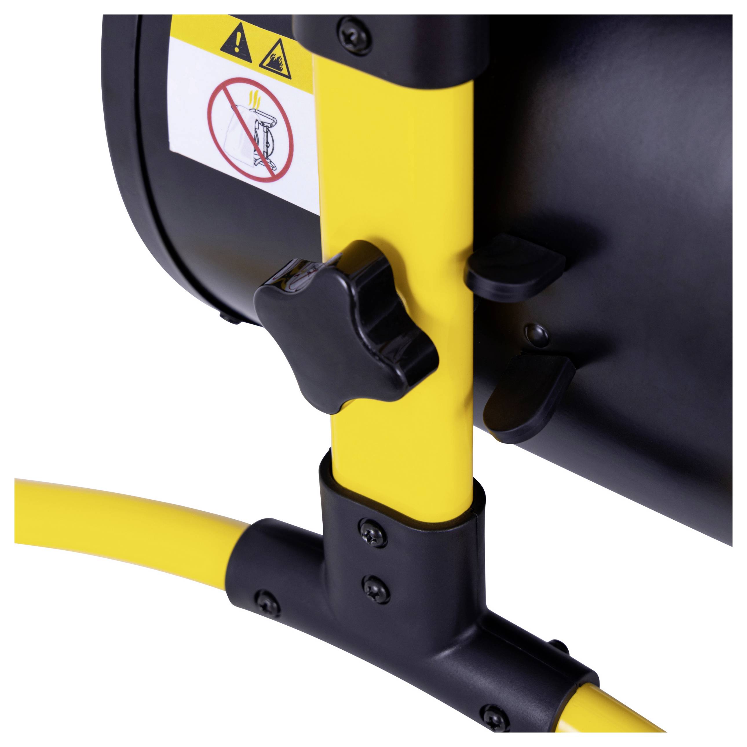 Eine Nahaufnahme eines gelben und schwarzen Heizkörpers mit einem Warnschild, das 