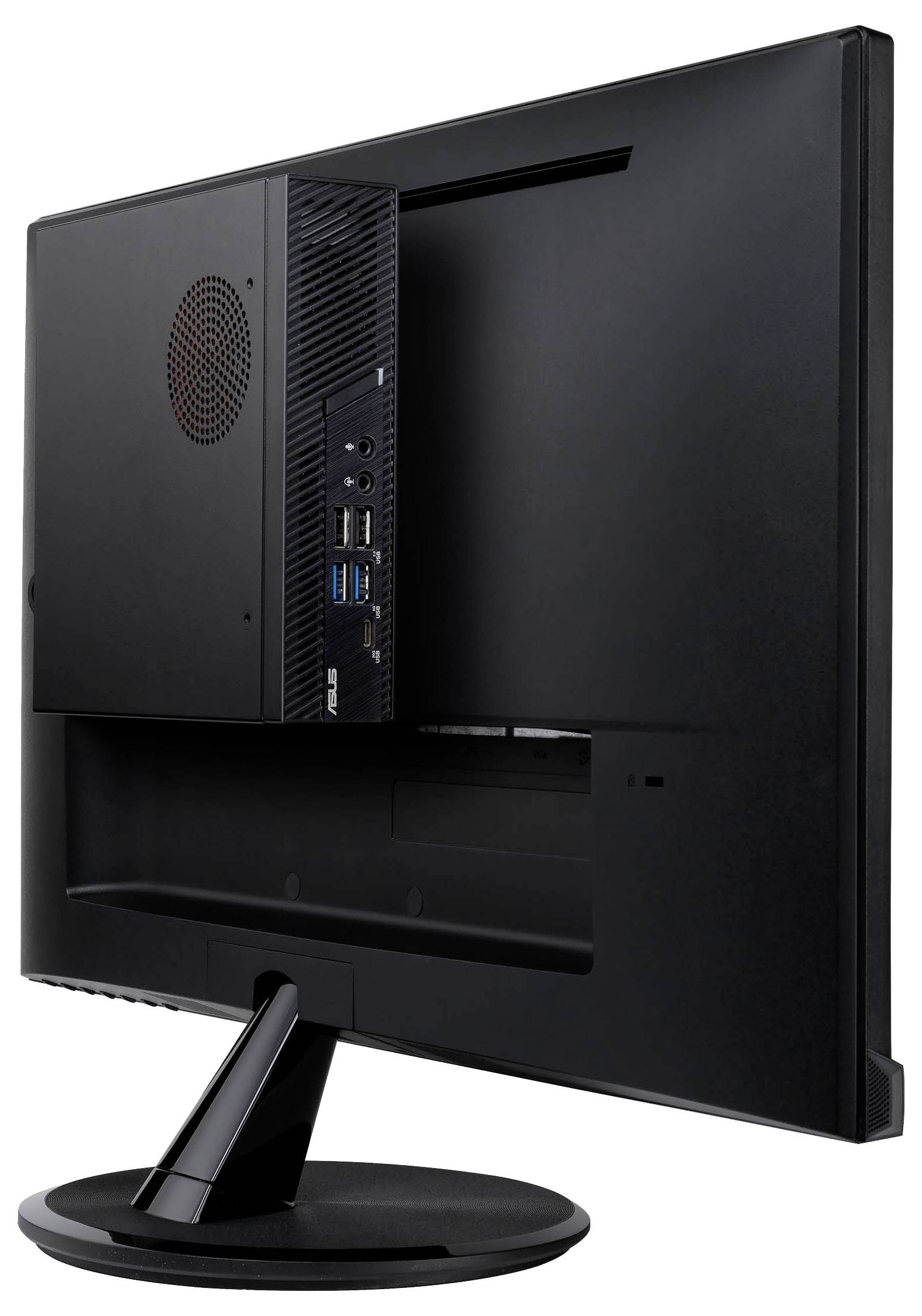 Monitor mit einem kleinen, rechteckigen Computer an der Rückseite montiert. Mehrere Anschlüsse sind sichtbar.