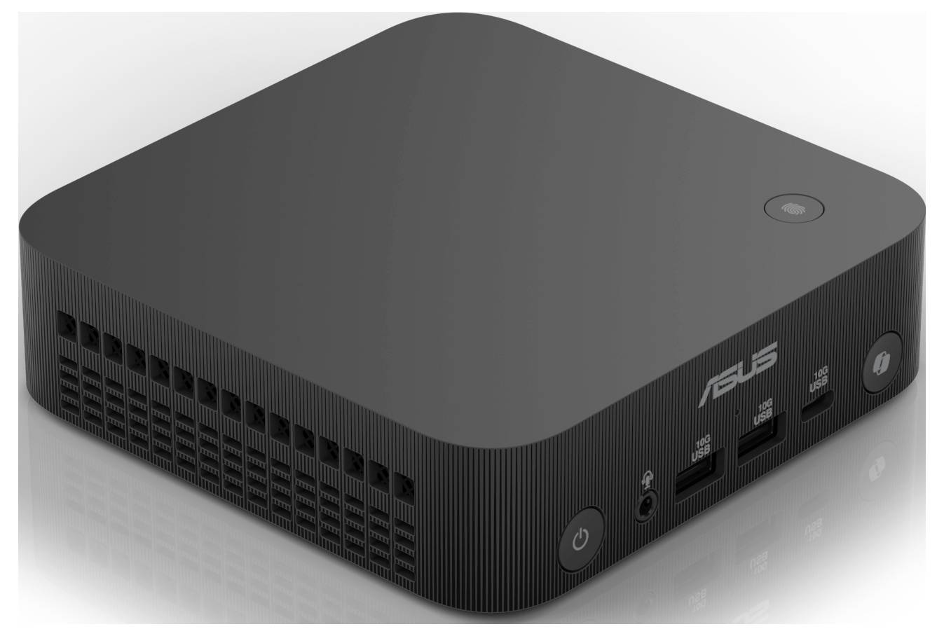 Ein kleiner, quadratischer Mini-PC von ASUS mit mehreren USB-Anschlüssen an der Vorderseite und Belüftungsschlitzen an der Seite.