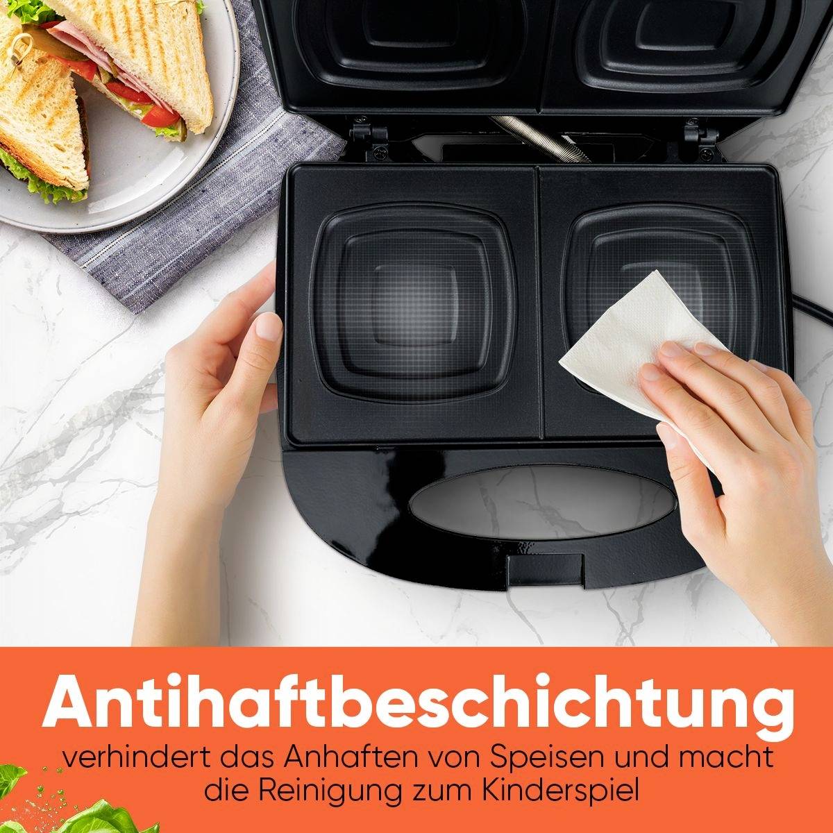 Person reinigt Sandwich-Maker mit einem Tuch. Der Text 'Antihaftbeschichtung verhindert das Anhaften von Speisen' ist sichtbar.