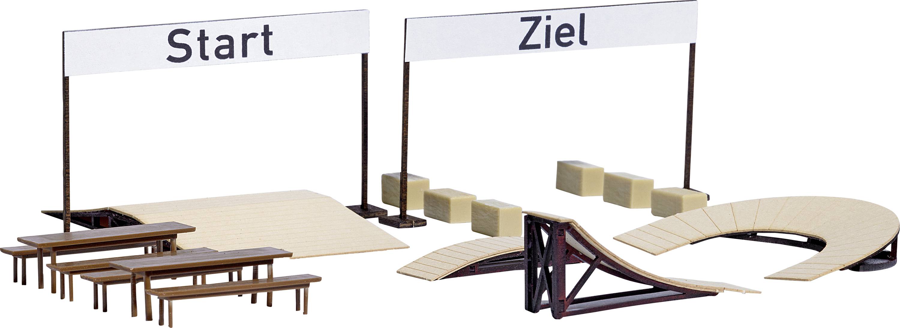 Start- und Zielbereich eines Miniatur-Skaterrampenparks mit Rampen, Kurven und Sitzgelegenheiten, dargestellt durch Modellbauzubehör.
