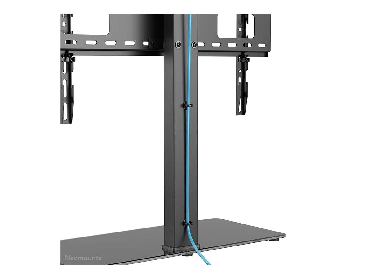 Flacher schwarzer TV-Ständer mit blauem Kabelmanagement entlang der Rückseite.