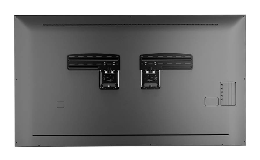 Rückseite eines großen Bildschirms mit zwei Montageschienen in der Mitte, mehreren Lüftungsschlitzen und einem Bedienfeld rechts.