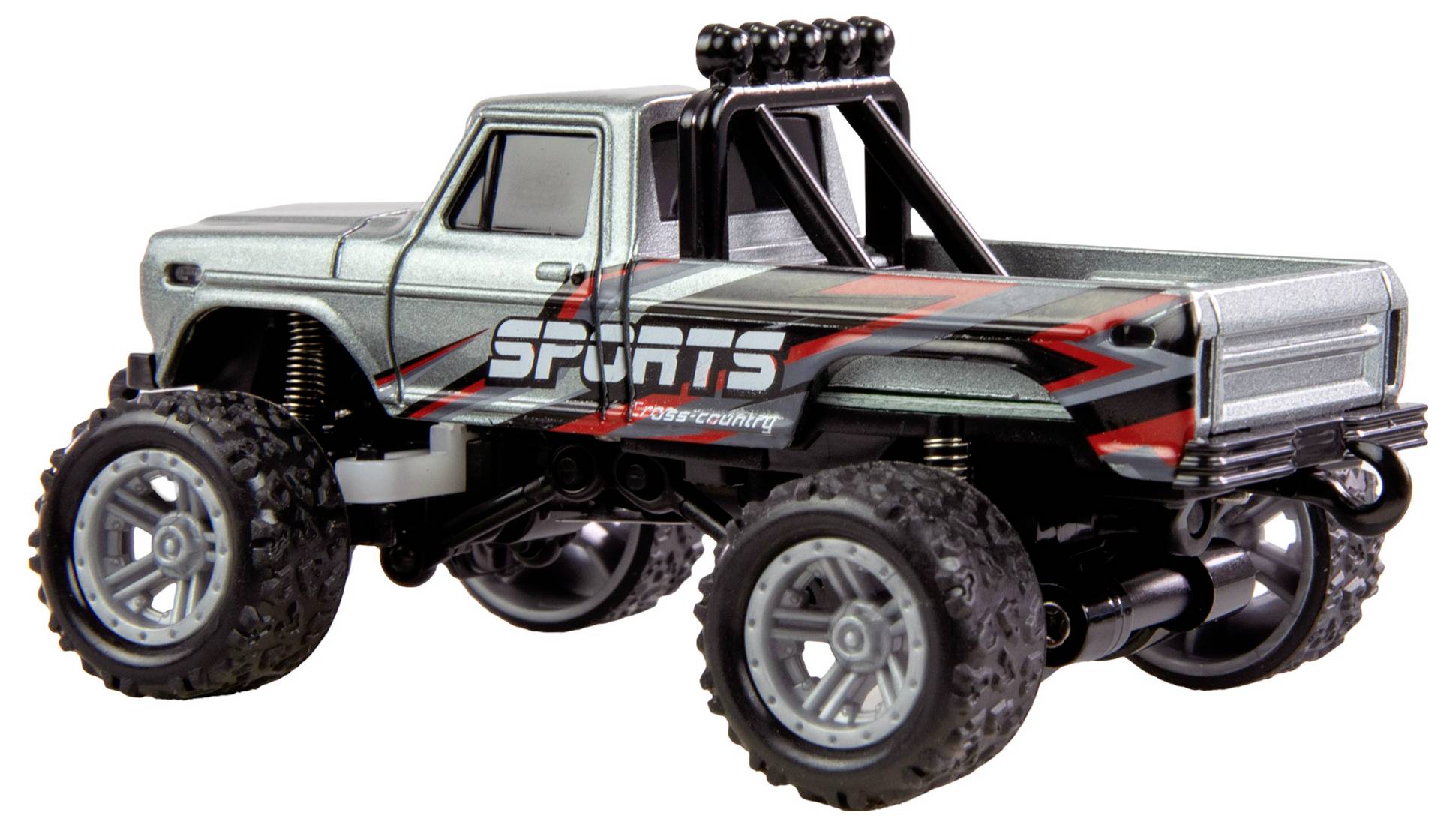 Spielzeug-Monstertruck, silber mit roten Akzenten, großer Schriftzug 'SPORTS' auf der Seite. Große Reifen, Geländewagen-Design.