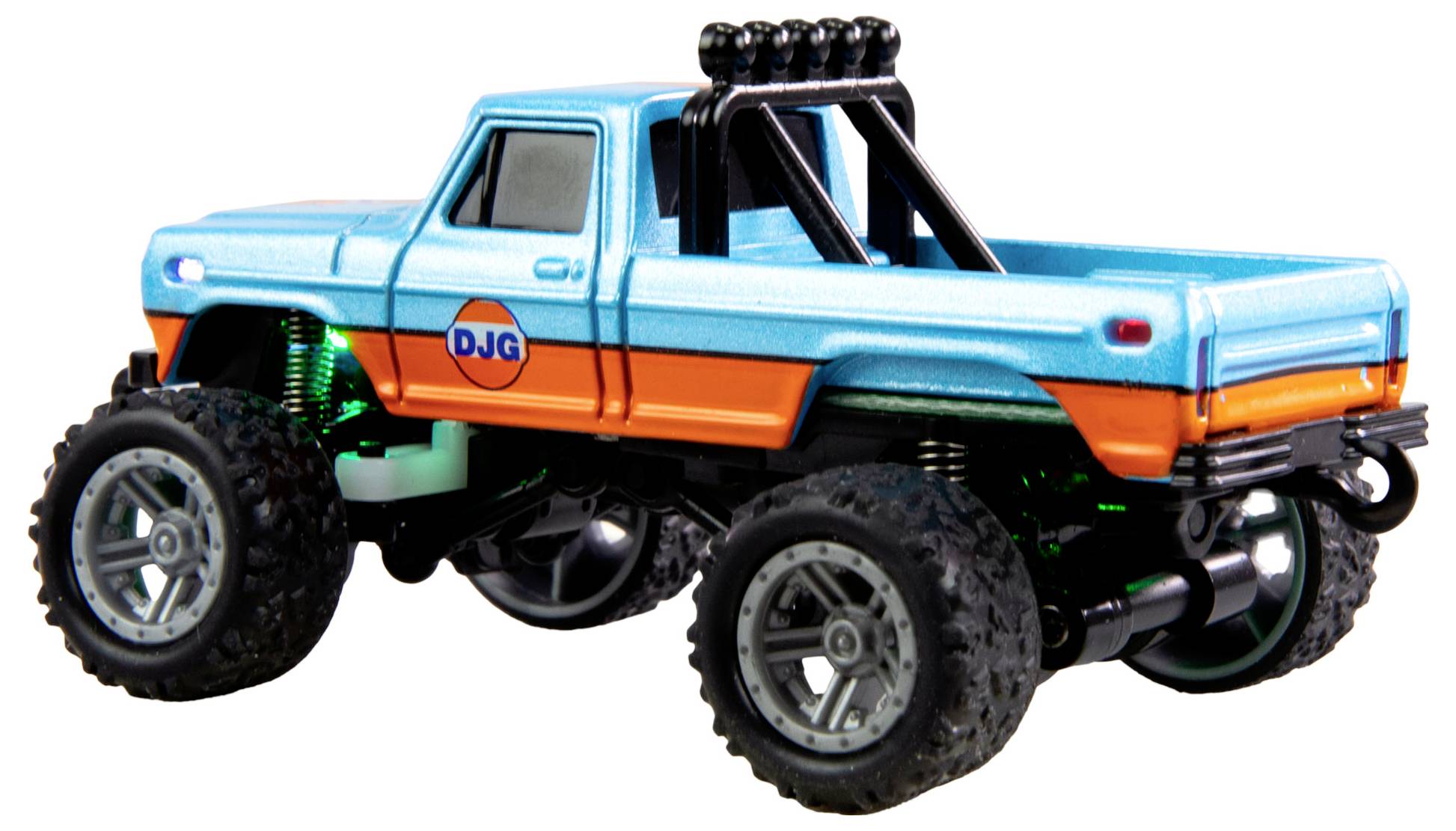 Spielzeug-Monstertruck aus Metall in Blau und Orange mit großem Fahrwerk und robusten Reifen. Rückansicht des Fahrzeugs.