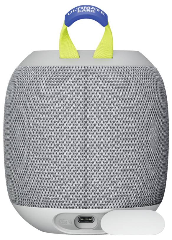 Grauer tragbarer Lautsprecher mit gelbem Griff und blauem 'Ultimate Ears'-Band, zeigt eine runde Form mit Gittermuster.