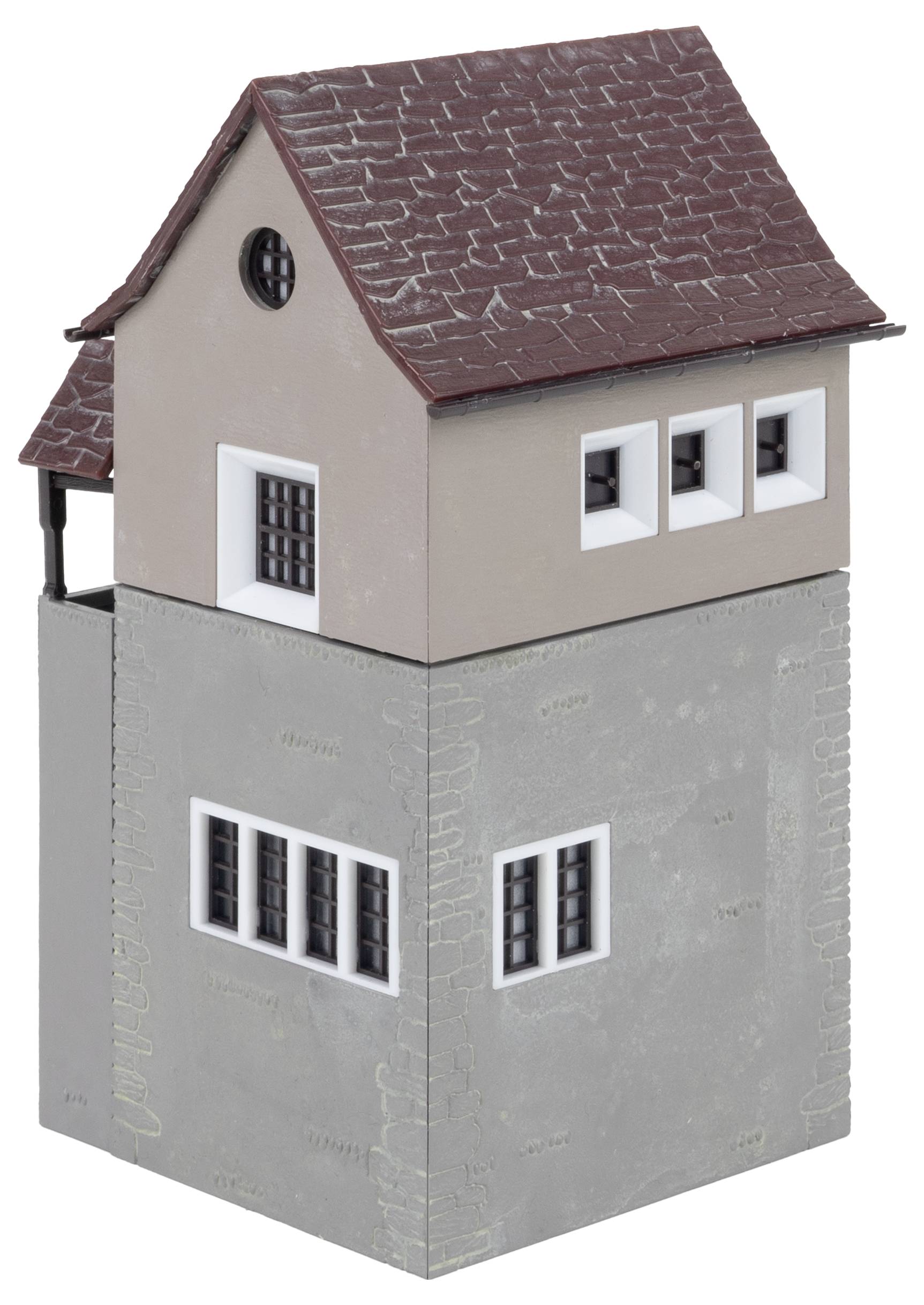 Ein dreistöckiges Modellgebäude mit grauer Fassade und braunem Dach. Das obere Stockwerk hat kleine Fenster und Giebel.