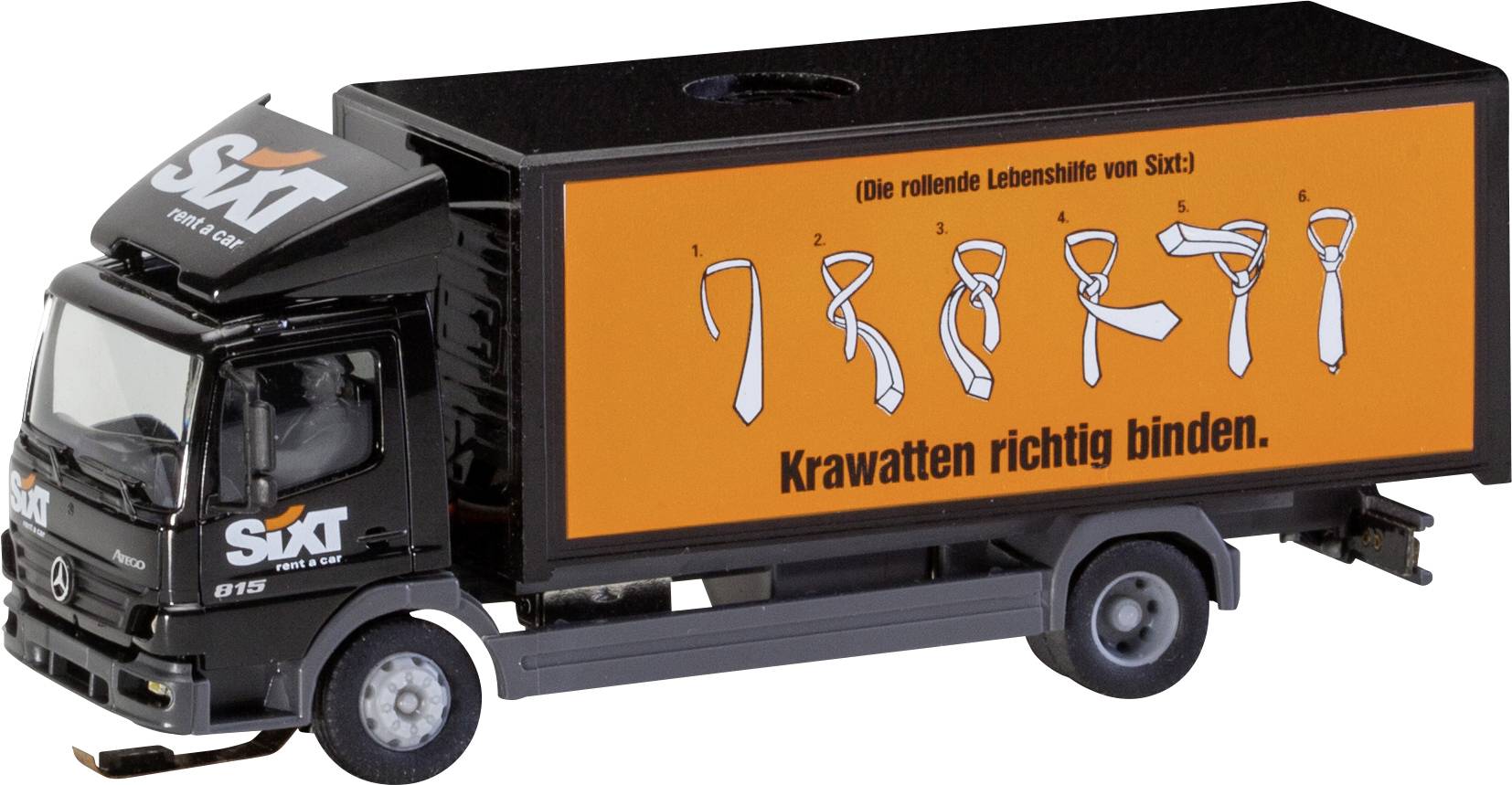 Ein Spielzeug-LKW mit Sixt-Logo zeigt auf der Seite Anleitungen zum Krawattenbinden in sechs Schritten unter der Aufschrift 'Krawatten richtig binden'.